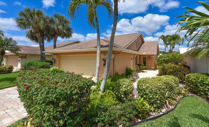 Totally renovated waterfront Bluffs home, 2 Bd, plus den/third bedroom, loft, enlarged kitchen open to living area, over 300 Sq.Ft. added to living space, Impact sliders and windows throughout.  High quality wood cabinets, high end stainless steel appliances, beautiful granite counters. Florida room is air conditioned and part of main house, outside custom built Alfresca grill, heated pool & lighting all controlled by Jandy system. Custom interior lighting, solid 8' wood pocket doors throughout, huge pantry with built-in shelves, built-in wine cooler, built-in laundry hamper's,  etched glass front door. Electronic window treatments on all sliders. Maintenance free rear yard/tropical landscape with paver bricks on driveway, walkway and rear patio. Custom built-ins in air conditioned Garage