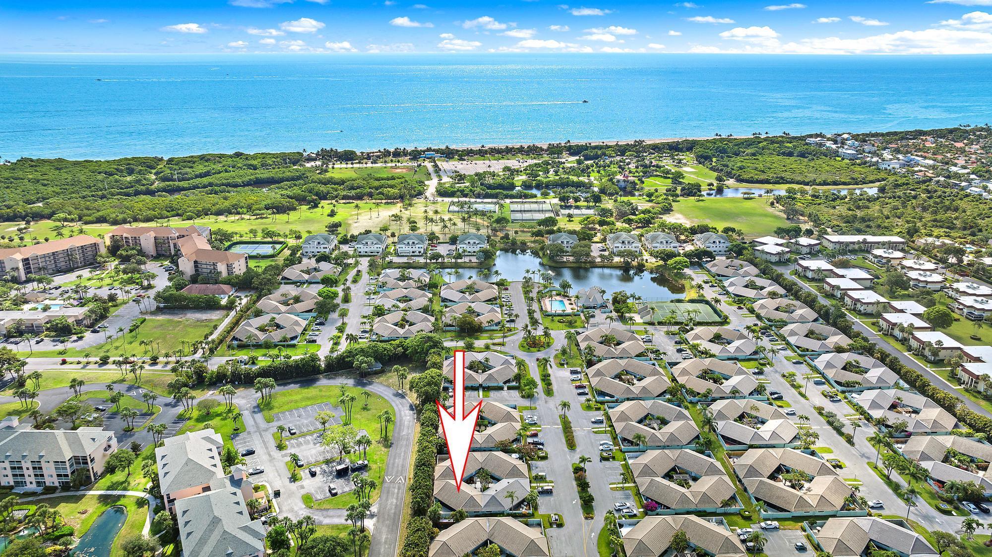 Come see this 2 bedroom, 2 bathroom villa (not condo) within WALKING distance to beautiful beaches, 6 new pickleball courts, and Jupiter's most popular restaurant, Food Shack. Roof replaced in 2018, A/C replaced in 2019 and water heater replaced in 2017. The kitchen features stainless steel appliances, wood cabinetry and granite countertops. Desirable split floorplan and walk-in closets in each bedroom. Enjoy outdoor living in the oversized screened in lanai and the backyard is fully fenced. Bella Vista consists of 136 Villas and is a pet friendly community - allowing 2 pets and maximum weight of 30 lbs per pet. Great investment opportunity - can rent right after purchasing - minimum of 30 days and 2 rentals per year. Best location in Jupiter!