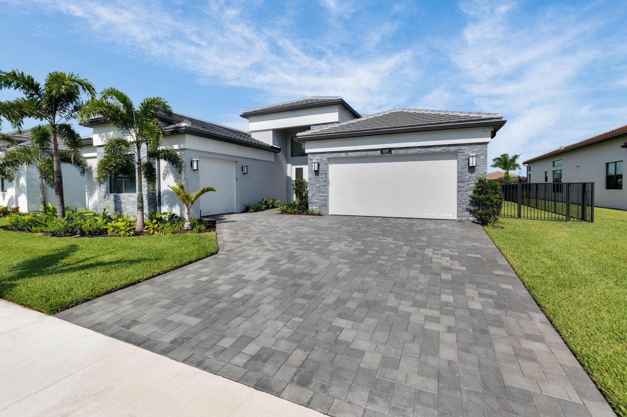 Spectacular 3 BD 4 BA POOL Home on a PREMIUM LAKE LOT in the Most Exclusive 55+ GL Valencia Grand in Boynton Beach. Carmel Model Features OVER $500,000 IN UPGRADES. Built in 2024, this Brand New Never Lived In Spacious Home Offers an Open Floor Plan Filled with Natural Light. Club Room, Office/Den, Great Room.  Chef's Gourmet Kitchen Features Contemporary Cabinetry, Quartz Countertops, Stainless Steel Appliances w Gas Cooktop & Double Oven. Lakeview Primary Suite with Two Spacious Walk-in Custom Closets & Large Ensuite Bathroom. Additional Upgrades include Customized Entertainment Wall Unit, Mudroom, Pantry, Summer Kitchen, Expanded Fenced in Area, Expanded Driveway, Separate 2 and 1 Car Garages w/ Epoxy floor, Cabinetry & AC. 44,000 Sq Ft CLUBHOUSE HAS IT ALL.. Schedule Your Showing Tod Clubhouse includes Grand Social Hall &amp; BALLROOM, Sports Lounge with billiard tables, poker tables and golf/sports simulator. CARD ROOMS, INDOOR/ OUTDOOR PICKLEBALL COURTS,  TENNIS COURTS, BOCCE BALL COURTS, ARTS AND CRAFTS ROOM, RESTAURANT/POOL BAR, MIND/BODY SPA, GYM, RESORT STYLE/LAP/RESISTANCE POOLS, OUTDOOR BAR, CARD ROOMS, CULINARY KITCHEN &amp; MORE. Valencia Grande is all about community. Endless clubs, events, and activities every day of the week. Close to shopping &amp; restaurants and all major highways.