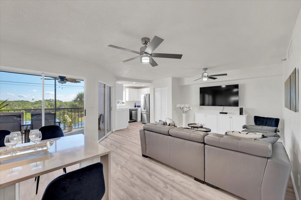 Your Coastal Oasis Awaits at Jupiter Bay East!Whether you're dreaming of a serene vacation escape or seeking an income-producing property with flexible rental options, this beautifully remodeled, fully furnished condo checks every box. Just completed renovations blend modern luxury with beachside charm. This turnkey gem is ready for immediate enjoyment or bookings!Step inside to discover a stunning open-concept layout, perfect for entertaining. The living, dining, and kitchen areas flow effortlessly, highlighted by a calming palette of soft whites, creams, beiges, and greys. The kitchen is a showstopper, featuring sleek quartz countertops, custom cabinetry, and stainless steel appliances all thoughtfully designed with style and functionality in mind. Jupiter Bay East's resort-style amenities include a sparkling pool, spa, tennis courts, and the popular on-site Twisted Tuna Restaurant perfect for poolside lunches, happy hours, and alfresco dining.

Don't miss this rare opportunity to own a piece of paradise. This isn't just a condo&#x14;it's a lifestyle. Schedule your showing today and make this stunning Jupiter Bay East retreat your own!