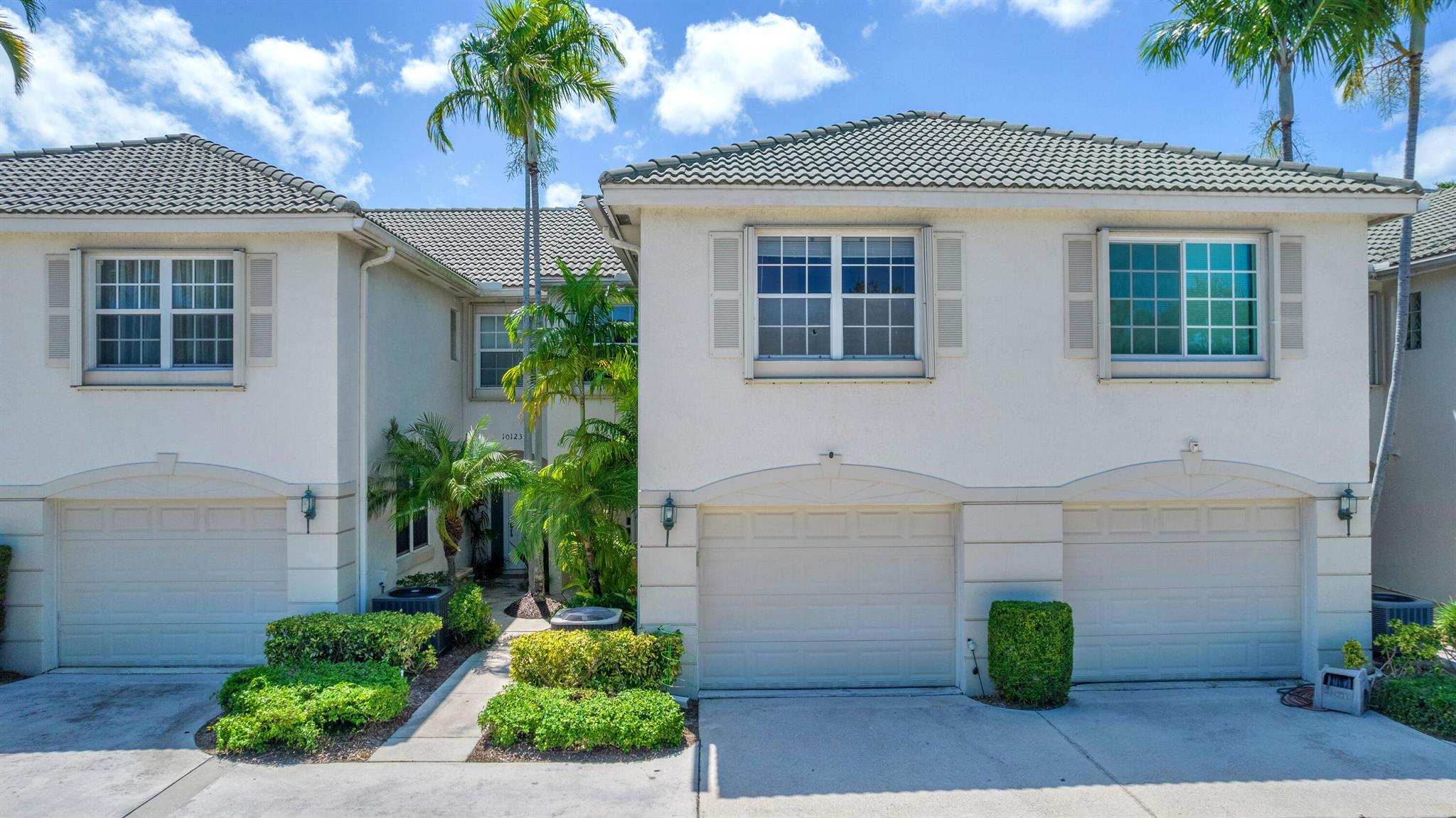 Low HOA.  Enjoy wide-open views of canal and green space from your private, covered screen patio. This CBS home features a barrel tile roof, open kitchen w/pantry; tile floors downstairs along with beautiful wood laminate upstairs. The over-sized garage features plenty of shelving and storage space. Great location close to restaurants, shopping, schools, parks and recreation areas. Don't miss this opportunity. Please call or email if you have questions, or would like to schedule a private showing.