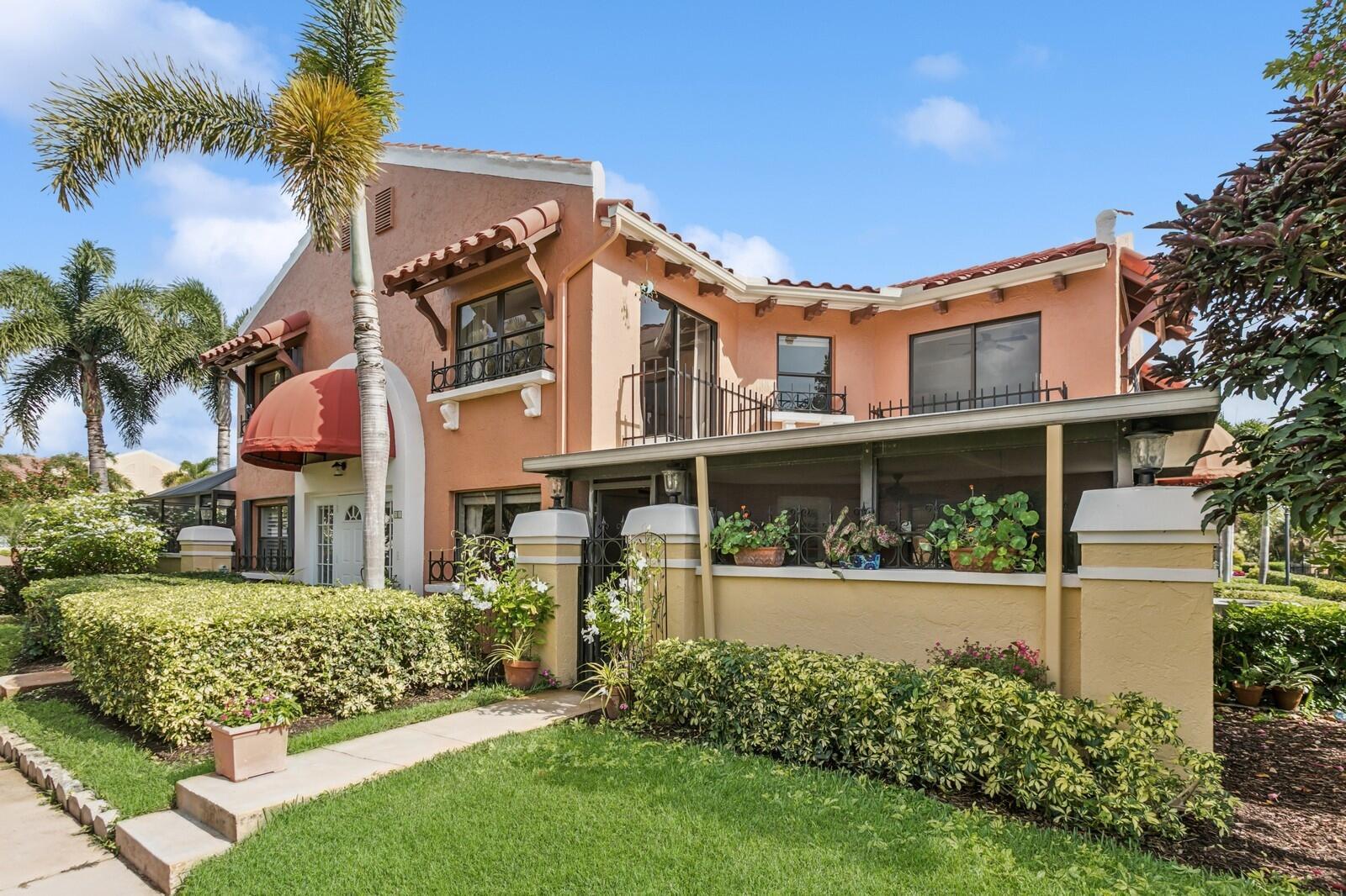 Charming coastal villa in Juno Beach's gated community Ocean Trace.  Both bedrooms offer large en suite baths, vaulted ceilings, multiple windows and sliders with tropical views.  Featuring a spacious covered lanai with southeast exposure; benefited by the breezy trade winds and natural light.  Uno Lago is in an exceptional location close to the beach, restaurants, and shopping.  Excellent 2nd home or investment property, can rent 4X a year, minimum 30 days.  2024 Roof and recently painted, all assessments already paid by seller, maintenance fee covers roof & exterior building insurance.