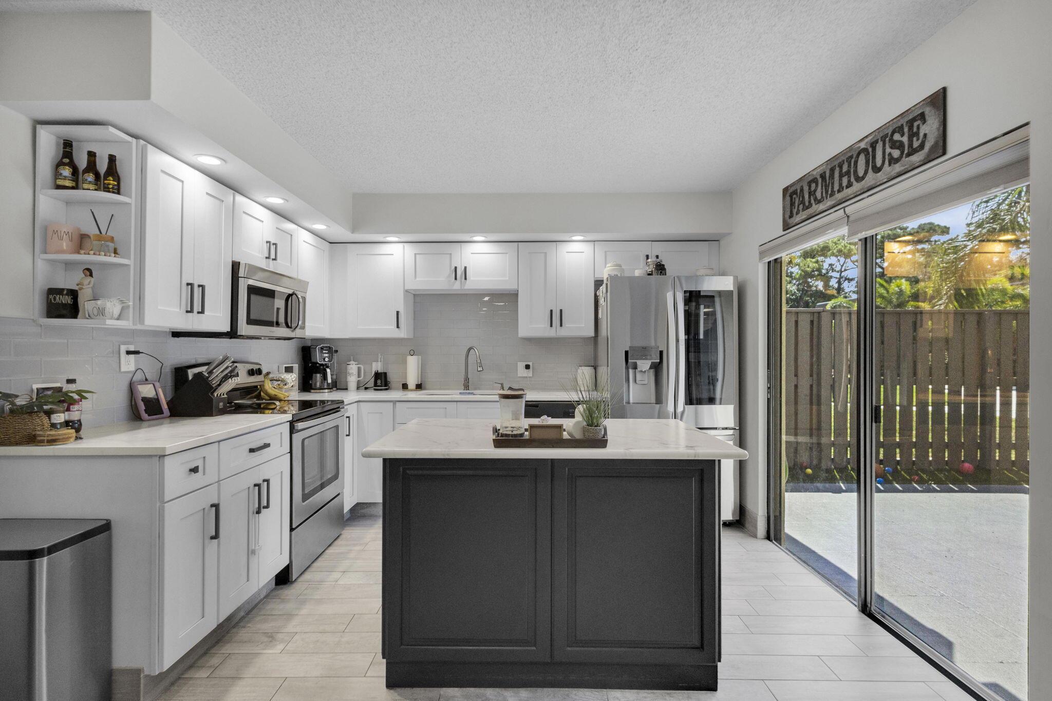 1302 13 Court Unit , Palm Beach Gardens, Florida 33410