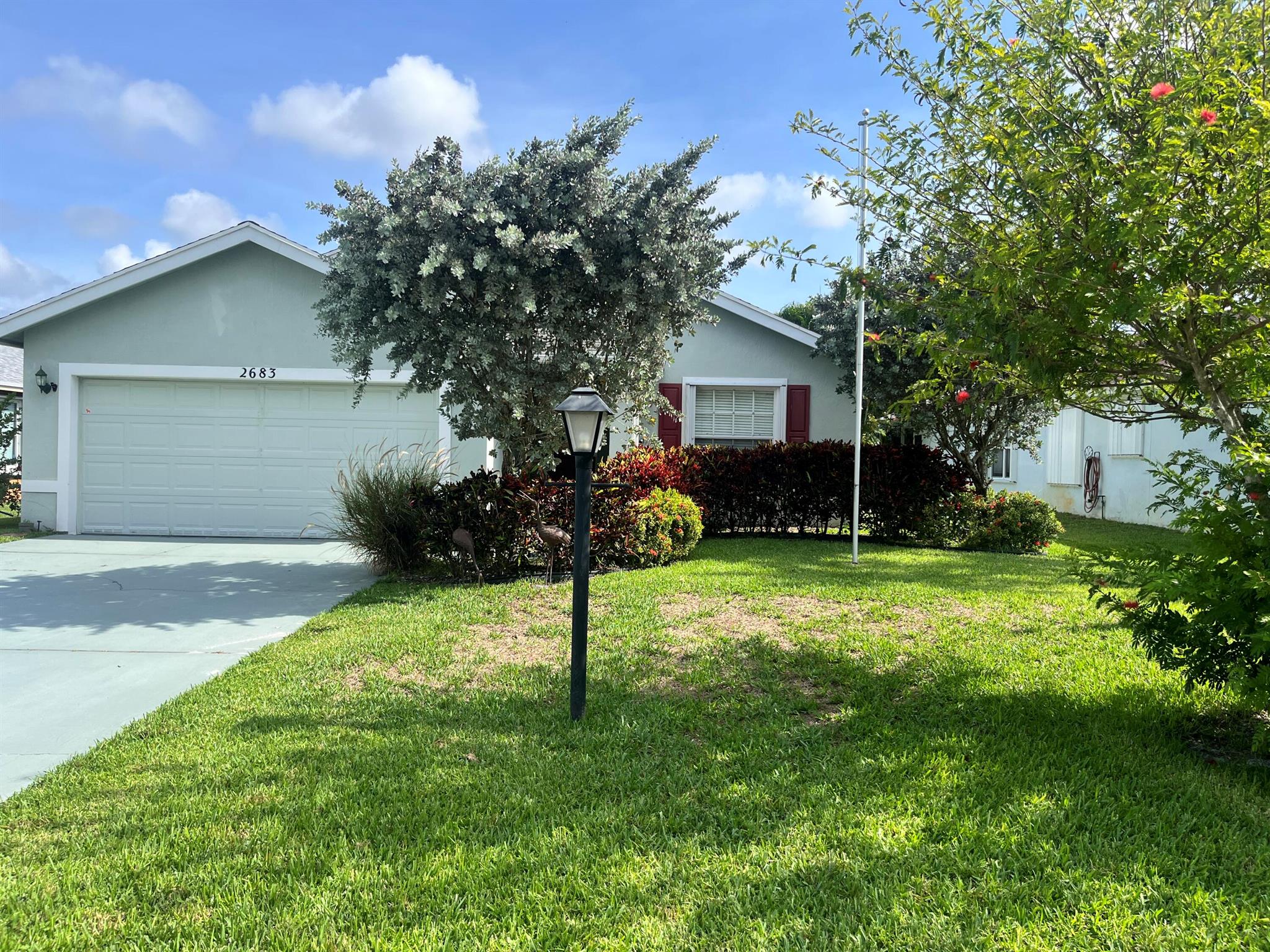 Welcome to your next chapter, this charming CBS home has 3 bedrooms, 2 baths and located in a vibrant 55+ community surrounded by a mix of all-age neighborhoods. Nestled on a spacious, private lot with a fully fenced yard, this property offers both tranquility and convenience.The home features a classic, original interior with great potential, perfect for buyers looking to personalize and update to their own style. With a split bedroom layout, generous living and dining areas, and a bright kitchen space, there's plenty of room to make it your own.Enjoy an active lifestyle in this amenity-rich 55+ community, known for its engaging social calendar, recreational facilities, and welcoming neighbors. You're just minutes from Interstate 95, grocery stores, & everyday conveinances.