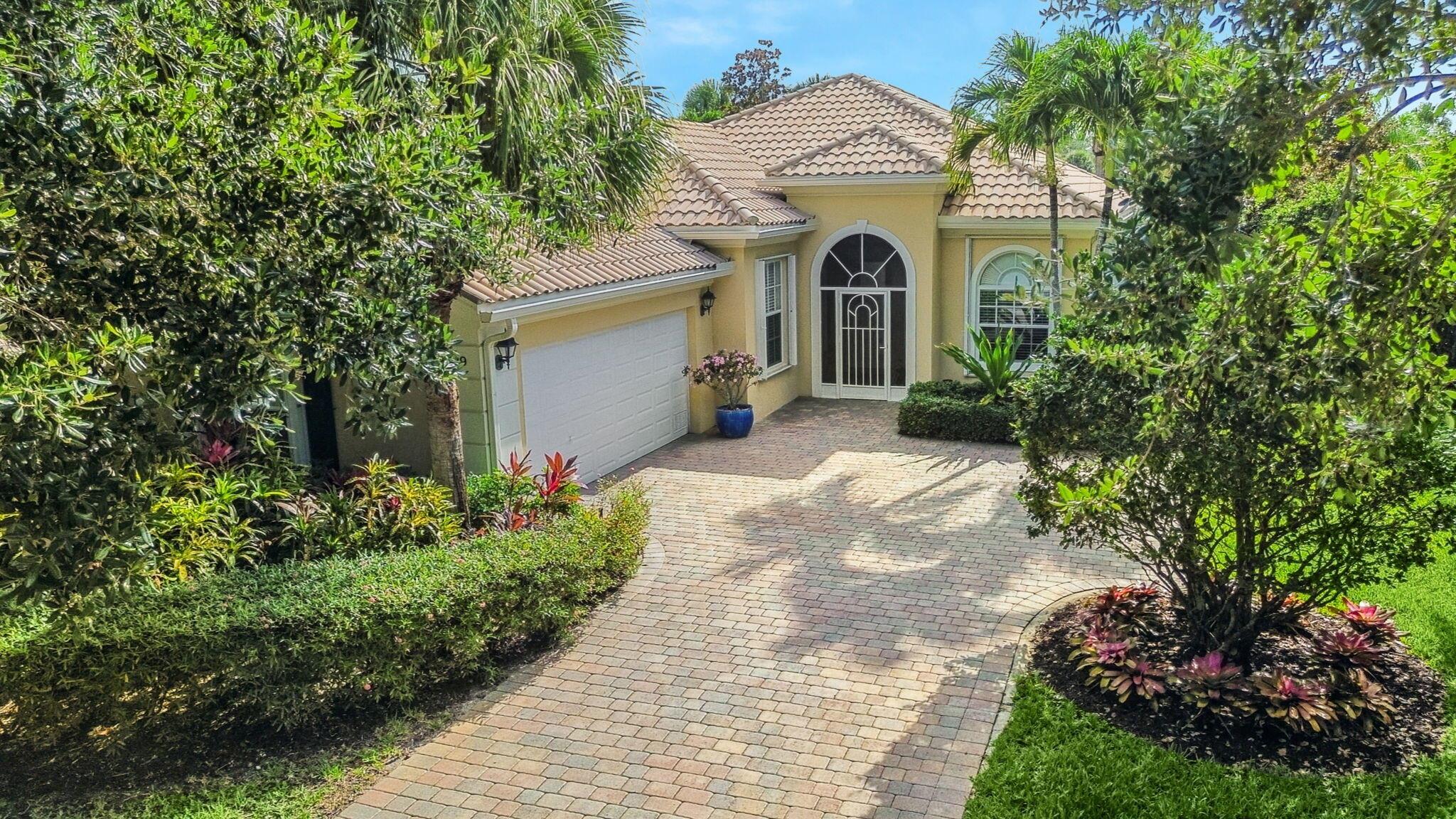 Welcome to this beautifully updated DiVosta-built home in the highly sought-after gated community of Magnolia Bay in Palm Beach Gardens! This 3-bedroom, 2-bath home offers 2,023 sq ft of comfortable, stylish living on an oversized lot with tranquil lake views. Enjoy Florida living at its best with a heated pool and screened enclosure, perfect for entertaining or relaxing in privacy. Inside, you'll find a fully updated kitchen and bathrooms, a spacious laundry room, and a two-car garage with epoxy flooring. The split-bedroom floor plan adds flexibility and privacy, ideal for families or guests. Built in 2004 with DiVosta's renowned quality, this home is located in a community that features a clubhouse, tennis courts, resort-style pool, exercise room, and beautifully maintained grounds. All this in a prime location just minutes from top-rated schools, major highways, world-class shopping, dining, and premier employment centers. Don't miss your chance to own a slice of paradise in Magnolia Bay!