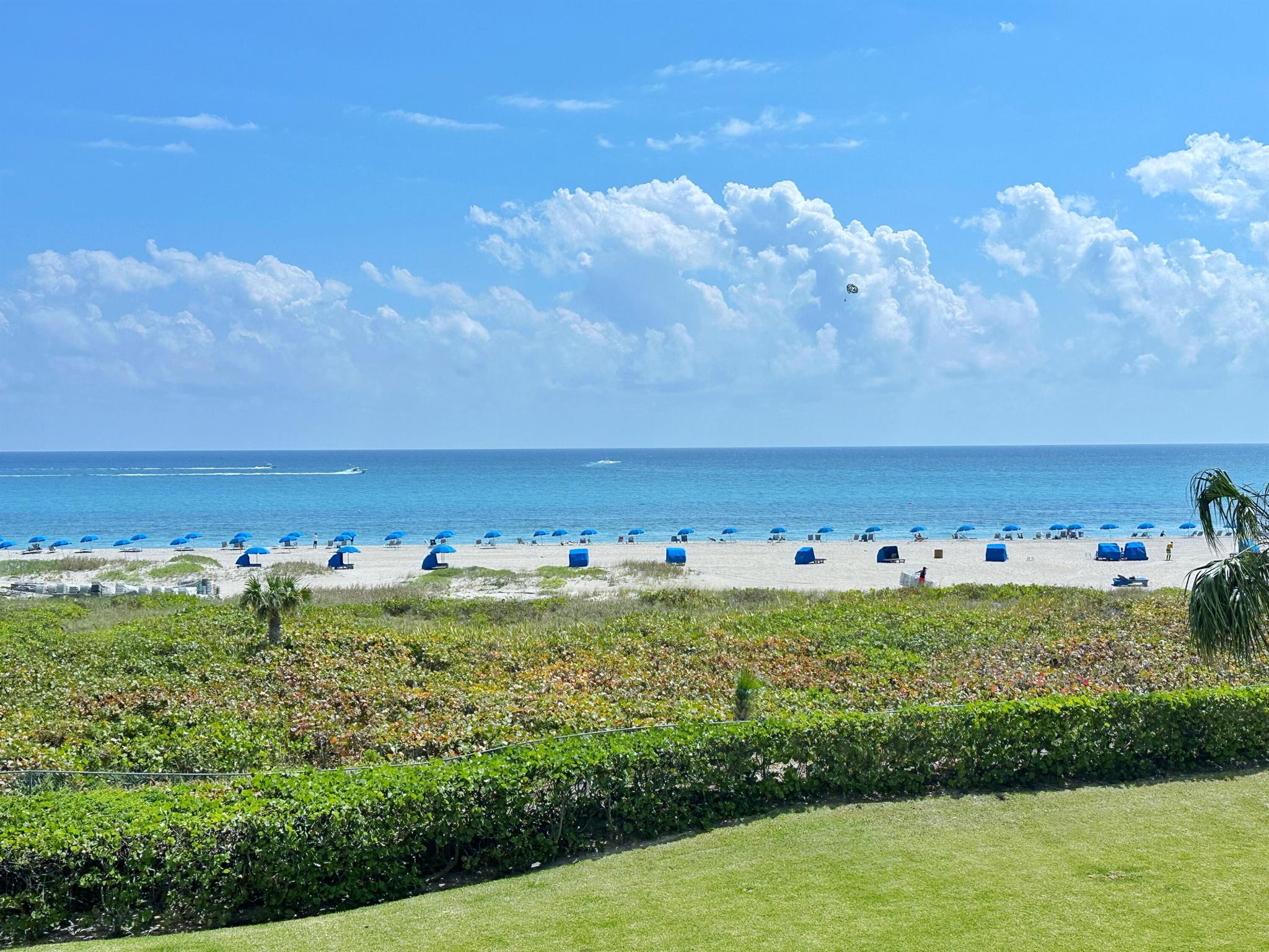 Stunning oceanfront elegance! This calming home feels like your private beach house with views from every room of the seagrapes, sand and sparkling Atlantic. Meticulously upgraded and maintained, this unit offers high end finishes throughout including a well-equipped custom kitchen with quartz countertops, luxury appliances and wine cooler. Large format tile flows seamlessly through each room of the unit. All windows feature remote controlled blinds and translucent doors that bathe the home in light. Enjoy the ultimate entertainment experience with a custom AV system. California closets round out the custom details that define this beautiful home. Tiara offers a resort lifestyle with 24 hr concierge, valet, 2 restaurants with delivery, fitness centers, tennis, pickleball and much more.