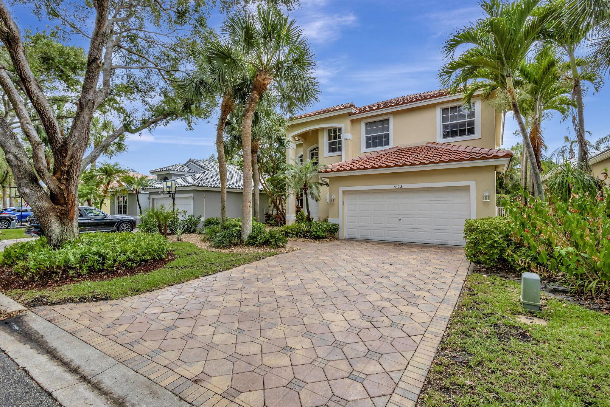 Nestled on a picturesque tree-lined street, this beautiful home offers comfort and charm in every detail. A brand new roof adds peace of mind, while the screened-in patio and sparkling pool invite year-round relaxation. Enjoy lush, professionally landscaped grounds and an oversized garage with ample storage. Inside, the gourmet kitchen features all-wood cabinets and granite countertops. All bedrooms are upstairs, including a spacious owner's suite and a versatile loft perfect for work or play. Located within walking distance to a house of worship and just minutes from shopping and amenities--this home combines convenience and elegance wrapped up in one perfect package.