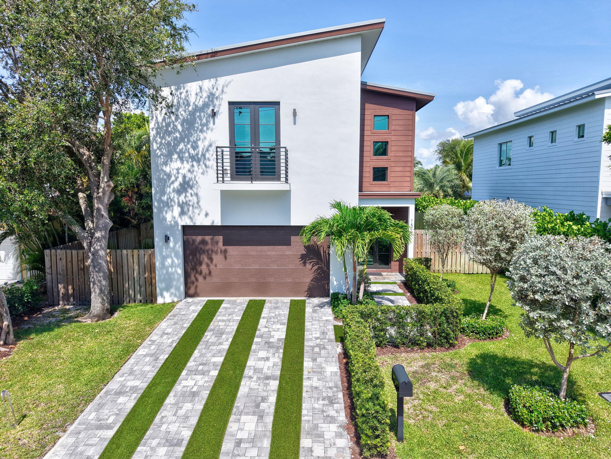 Welcome to 1517 N. Lakeside Drive -- a stunning 2022 built home nestled on one of the most desirable streets in Lake Worth Beach. Just blocks from the intracoastal, and a short walk or bike ride to the beach, golf course, and downtown, this modern masterpiece offers the perfect blend of luxury, convenience, and coastal charm.Step inside to find high ceilings, wide-plank floors, and an open-concept layout designed for easy living and entertaining. The chef's kitchen features custom cabinetry, quartz countertops, and top-of-the-line appliances. Oversized sliders connect the bright living area to a private backyard pool oasis. Upstairs, the primary suite boasts a spa-like bathroom, custom walk-in closet, and covered balcony with water glimpses. Additional bedrooms are generously sized with abundant light and high-end finishes throughout.

This home is elevated and built to the latest codes, offering peace of mind and potential insurance savings.

Minutes from the Palm Beach Island, The Park Golf Course, The Breakers, and Worth Avenue, with easy access to the airport, I-95, and everything South Florida has to offer.

Location. Design. Lifestyle. This is South Florida living at its best.