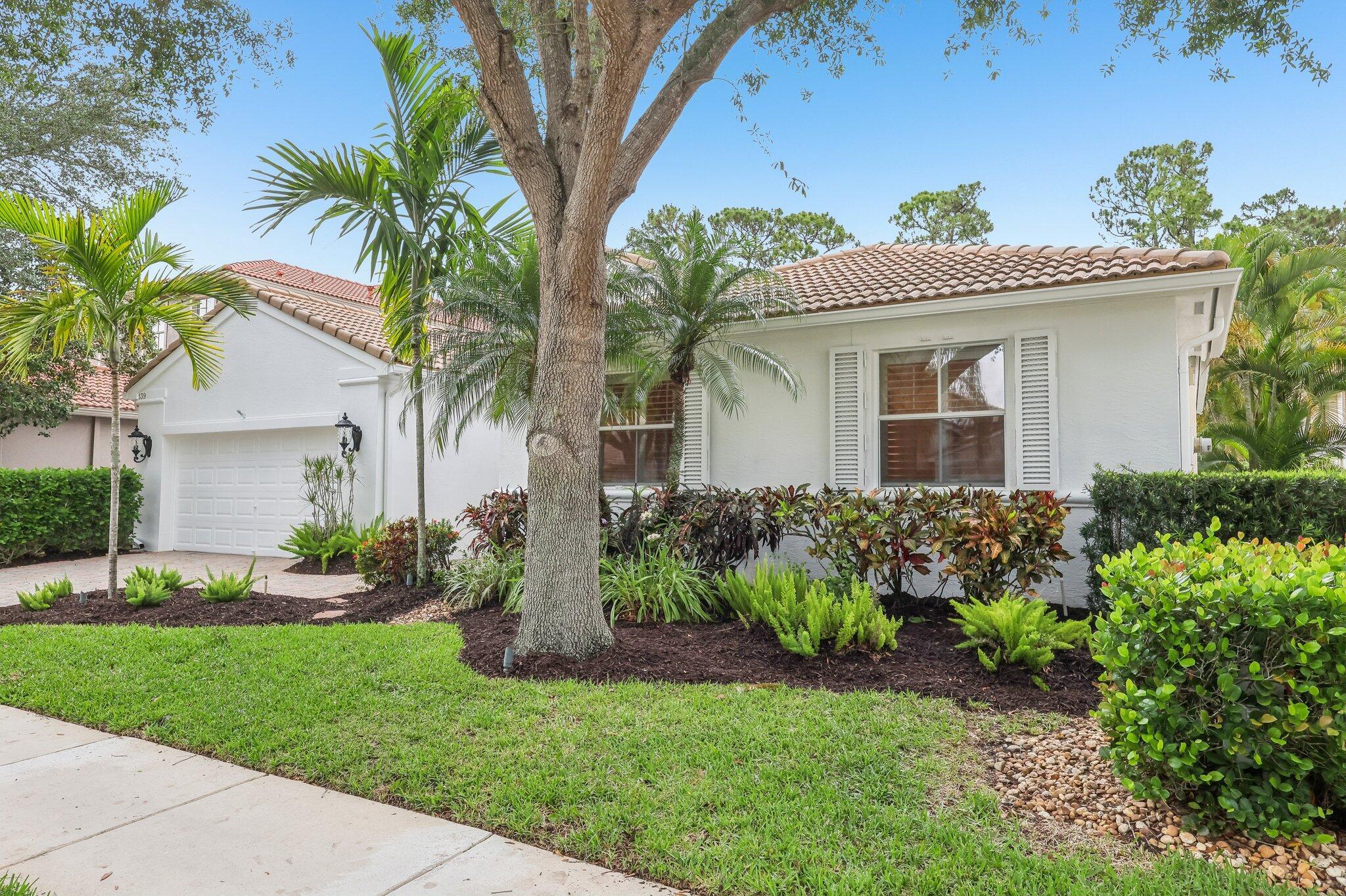 Live the Palm Beach Gardens lifestyle in the sought-after gated community of Mirabella, where this elegant single-story heated pool home blends comfort, style, and thoughtful upgrades. Featuring 4 bedrooms, 2.1 bathrooms, and a 2-car garage. 139 Sedona Way welcomes you through decorative glass double front entry doors into a bright, open layout filled with natural light.  The upgraded kitchen offers a balance of form and function with quartz and granite countertops, wood cabinetry with pull-out drawers, and a decorative backsplash. A full suite of stainless steel appliances, including a gas burner cooktop, double oven, and Miele dishwasher, delivers both performance and style. Step outside to your own private retreat, complete with a heated pool, brick paver patio, electric screened enclosure, and a gas line for grilling&#x14;ideal for enjoying Florida's outdoor lifestyle year-round. New landscape lighting and a generous fenced in backyard add to the home's outdoor appeal.
Inside, the home is thoughtfully designed for both everyday living and entertaining, featuring a built-in entertainment wall unit, a Murphy bed, and versatile spaces that adapt easily to your needs.
Additional highlights include a whole-house water filtration system, two newer AC units (2021 &amp; 2023), 2022 garage motor, 2017 hot water heater and impact windows, accordion and colonial-style hurricane shutters, and a tiled garage with overhead storage.
Mirabella offers resort-style amenities with no membership fees and low HOA dues, including a clubhouse, fitness center, Har-Tru tennis courts, card room, and a children's clubhouse. Zoned for A-rated schools and conveniently located near beaches, dining, golf, and major highways&#x14;this home truly captures the best of Florida living.