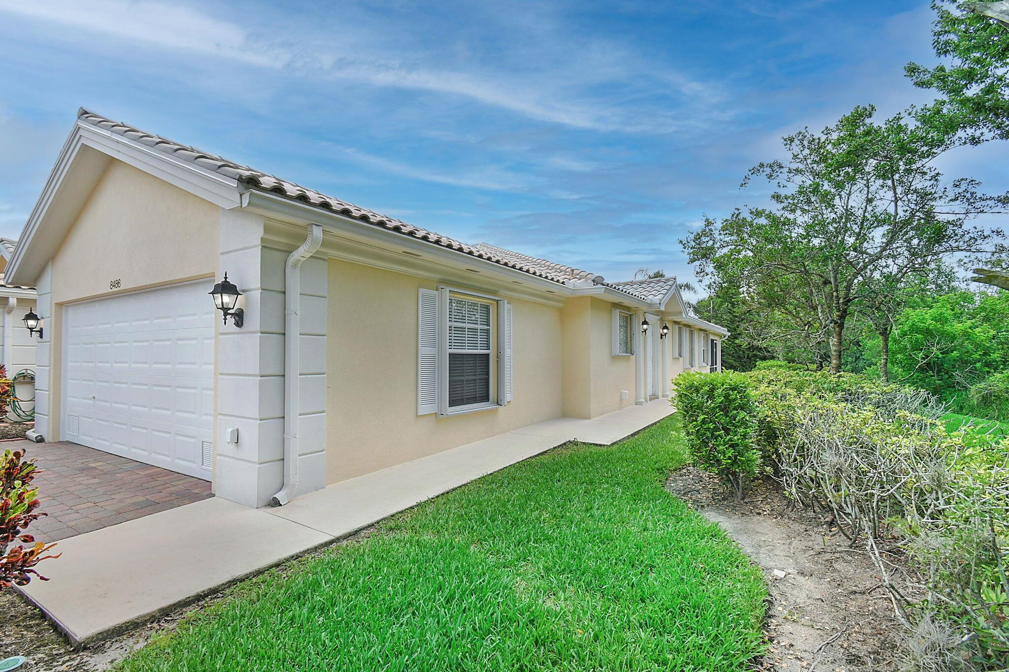 DISCOVER THIS OUTSTANDING CAPRI END UNIT. NO ADJACENT NEIGHBORS!  MOTIVATED OWNERS. NEWER A/C, WATER HEATER, ACCORDION HURRICANE SHUTTERS AND APPLIANCES.  DIVOSTA REINFORCED POURED CONCRETE CONSTRUCTION.  SURROUNDED BY 5,000 ACRE ATLANTIC RIDGE STATE PARK.  AMENITIES INCLUDE CLUBHOUSE, STATE-OF-THE-ART FITNESS CENTER, FOUR LIGHTED TENNIS/PICKLEBALL COURTS, RESORT-STYLE HEATED SWIMMING POOL, SECURED MAIL ROOM.  MAINTENANCE FEE INCLUDES CABLE (200 CHANNELS), INTERNET, FRONT & REAR MAINTENANCE, MONITORED SECURITY SYSTEM.  HOMES BUILT APPROX. 20' ABOVE SEA-LEVEL.  The neighborhood community program, RAN (Retreat Assistance Network) is available to all residents.