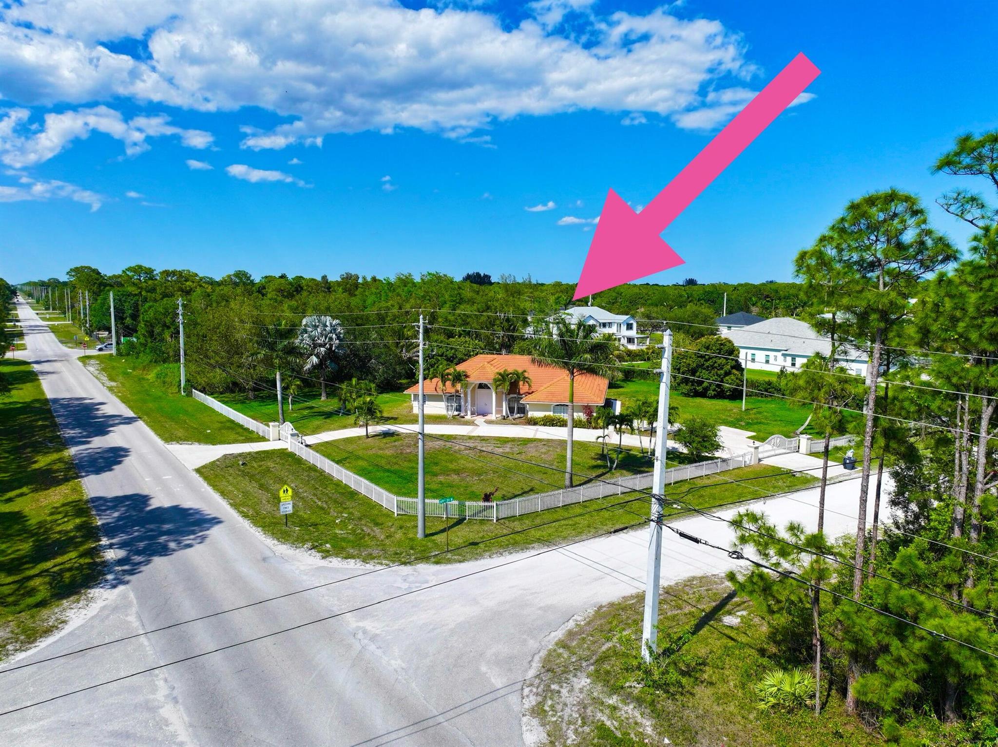 NO HOA **. PAVED ROAD **. CORNER LOT **  1.39 ACRES **.COMPLETE PACKAGE AND IDEAL FOR ANY FAMILY **. 4 BEDROOM 2 BATHROOM 2 CAR GARAGE  POOL HOME ** STUNNING SERENITY AWAITS-  17466 69TH ST N, LOXAHATCHEE FLORIDA 33470 **. WELCOME TO YOUR DREAM OASIS IN THE HEART OF LOXAHATCHEE !! THIS EXQUISITE PROPERTY OFFERS A PERFECT BLEND OF MODERN LIVING, AND NATURAL BEAUTY, NESTLED ON A SPRAWLING LOT SURROUNDED BY ALL NICE HOMES AND **.TRANQUIL SURROUNDINGS **. EXPANSIVE LIVING SPACE- THIS THOUGHTFULLY DESIGNED HOME BOAST 4 BEDROOM, 2 BEDROOMS, FEATURING  OPEN FLOOR PLAN THAT SEAMLESSLY CONNECTS LIVING, DINING, AND KITCHEN AREAS. PERFECT FOR ENTERTAINING OR COZY FAMILY GATHERINGS! GOURMET KITCHEN- THE CHEF'S KITCHEN IS A CULINARY DELIGHT, EQUIPPED WITH STAINLESS STEEL APPLIANCES, AMPLE CABINET CABINETRY, BREAKFAST BAR , BREAKFAST NOOK-THAT INVITES CREATIVITY AND CONVERSATION **. MASTER SUITE RETREAT- ESCAPE TO YOUR PRIVATE SANCTUARY IN THE LUXURIOUS MASTER SUITE, COMPLETE WITH 2 WALK IN CLOSET AND AN EN-SUITE BATHROOM FEATURING DUAL VANITIES AND A SOAKING TUB- IDEAL FOR UNWINDING AFTER A LONG DAY **. OUTDOOR PARADISE- STEP OUTSIDE TO YOUR VERY OWN SLICE OF PARADISE! THE EXPANSIVE BACKYARD IS PERFECT FOR OUTDOOR ENTERTAINING, WITH PLENTY OF SPACE FOR GARDENING, OR PLAYGROUND. ENJOY EVENINGS UNDER THE STARS ON THE PATIO OR TAKE IN THE SERENE VIEWS OF THE SURROUNDING NATURE . PERFECT LOCATION- SITUATED IN THE DESIRABLE LOXAHATCHEE AREA, YOU'LL ENJOY THE PEACE AND QUIET OF THE COUNTRY LIVING WHILE STILL BEING CONVIENTLY CLOSE TO SHOPPING, DINING, AND MAJOR THOROUGHFARES *. EXPERIENCE THE BEST OF BOTH WORLDS !! ENDLESS POSSIBILITIES- WITH AMPLE LAND, THERE'S PLENTY OF ROOM FOR YOUR HOBBIES, WHETHER ITS GARDENING, RAISING ANIMALS, OR BUILDING ADDITIONAL STRUCTURES. THE OPPORTUNITIES ARE LIMITLESS !! GET THIS CHANCE TO OWN THIS STUNNING PROPERTY WHERE TRANQUILITY MEETS MODERN COMFORT. SCHEDULE YOUR PRIVATE TOUR TODAY AND ENVISION YOUR FUTURE AT 17466. 69TH ST N, LOXAHATCHEE FLORIDA 33470 !!!