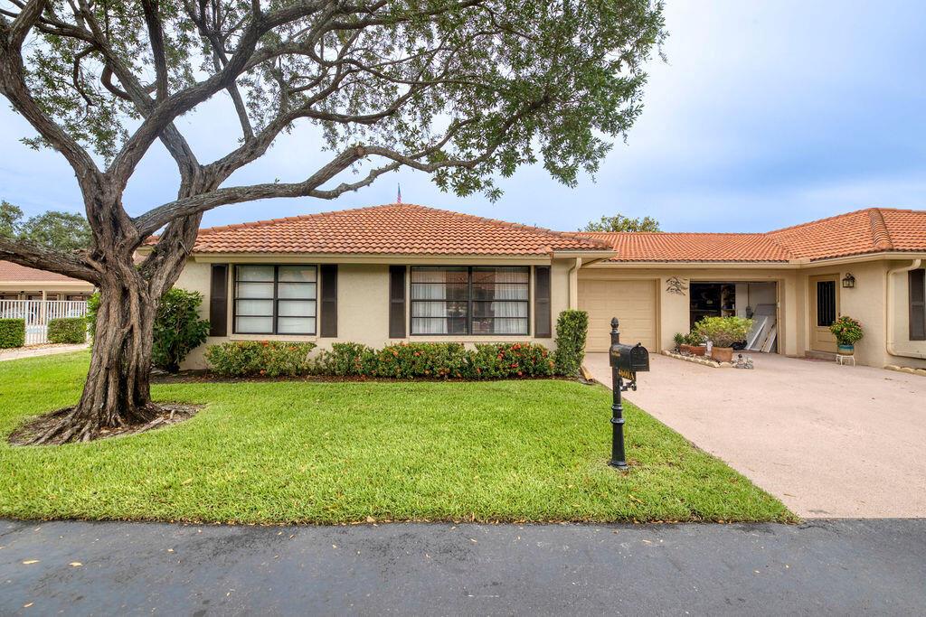 Ideally located in the gated 55+ community of Bent Tree Villas West in Boynton Beach, this bright and spacious one-story villa offers 2 bedrooms, 2 bathrooms, and a 1-car garage. Features include laminate flooring in the living areas, with peaceful green space views, and close proximity to the clubhouse. Both bathrooms have been recently updated with new tile, paint, and light, modern vanities. The driveway has also been restored and freshly painted. HOA covers exterior insurance, roof maintenance, lawn care, cable, and painting every 7 years. Sold furnished!!