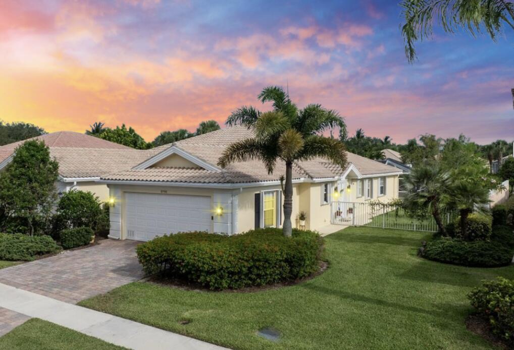 RARE OPPORTUNITY! Extended Waterfront Capri Model w/EXTRA LARGE FENCED SIDE YARD-perfect for kids or pets! Magnificent water views from the expanded screened patio w/ retractable awning is perfect for outdoor living! Special features include built-in cabinetry for extra storage, plantation shutters, granite countertops, stainless steel appliances, vaulted ceiling, bright & airy w/ lots of natural light. The en-suite primary bedroom w/ walk-in closet, bathroom w/ dual sinks & shower. Laundry closet w/ a full size washer/dryer & wet sink. Villagewalk HOA incl. Xfinity ultimate cable package & high speed internet service, home phone service, security alarm service monitored through All Tech security, a manned gate & rover, landscaping, ext. painting every 7 year, pressure cleaning. VillageWalk of Wellington blends small-town charm with resort-style living in a beautifully designed, master-planned, guard-gated community. Built by DiVosta with their signature Built-Solid construction, VillageWalk features 954 residences&#x14;ranging from 2-bedroom villas to 6-bedroom single-family homes&#x14;spread across 478 acres. The neighborhood is adorned with tree-lined streets, manicured lawns, picturesque bridges, and tranquil waterways, creating a truly stunning environment.

The community boasts 6 miles of biking and jogging trails, 93 acres of parks and green spaces, and is centered around 112 acres of lakes, waterways, and a protected wildlife preserve. Remarkably, 96% of the homes are located on waterfront cul-de-sac lots.
At the heart of VillageWalk is the vibrant Town Center, a recreational and retail hub that enhances the neighborhood's strong sense of community. Residents enjoy amenities such as a fitness center, library, card and meeting rooms, catering kitchen, and party spaces. The retail plaza includes a full-service restaurant (with dine-in, takeout, and catering options), a post office, convenience store, hair salon, and a separate nail salon.

VillageWalk offers activities for all ages and interests. Residents can join social clubs like the Moms Club, Ladies Juliette Club, bowling league, or Men Who Lunch. Events range from water aerobics, bingo, bridge, and poker nights to dinner dances, concerts, and holiday celebrations. Outdoor enthusiasts enjoy two pools, tennis, bocce, basketball courts, a tot lot, scenic walking paths, fishing, and kayaking.

Located in East Wellington, the community is within walking distance of A-rated schools&#x14;Equestrian Trails Elementary, Emerald Cove Middle, and Palm Beach Central High&#x14;and is just two miles from Okeeheelee Park and The Mall at Wellington Green. It's also a short drive to downtown West Palm Beach, the Kravis Center, Palm Beach International Airport, and some of Florida's finest beaches.

Wellington is globally recognized as an equestrian destination, and VillageWalk is ideally situated near the Palm Beach International Equestrian Center (home of the Winter Equestrian Festival), the Global Dressage Festival, and the International Polo Club of Palm Beach.