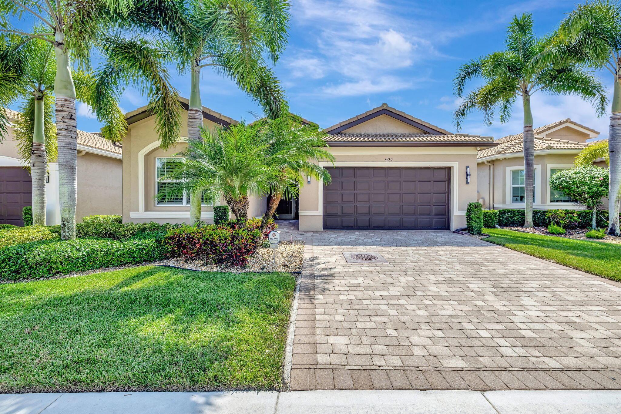 Step into comfort and style with this impeccably updated, move-in-ready home featuring a private heated pool--an uncommon luxury in this neighborhood. Perfectly positioned on a quiet, premium water lot just a short stroll from the clubhouse, the home offers peaceful views and everyday convenience.Inside, you'll find a bright, spacious layout with two generously sized bedrooms, a flexible den, and 2.5 beautifully renovated bathrooms. Fresh paint, brand-new flooring, and energy-efficient LED lighting give the space a clean, modern feel.The chef's kitchen stands out with its new stainless steel refrigerator and induction cooktop, ideal for both everyday meals and entertaining. Other standout features include solid impact glass for top-tier storm protection, custom-designed... closets, and a garage enhanced with built-in storage solutions.
A whole-house generator and a new A/C system&#x14;both under transferable maintenance contracts&#x14;offer worry-free comfort year-round.
Designed for both function and relaxation, this home blends smart upgrades with serene surroundings&#x14;making it a rare opportunity in the community.