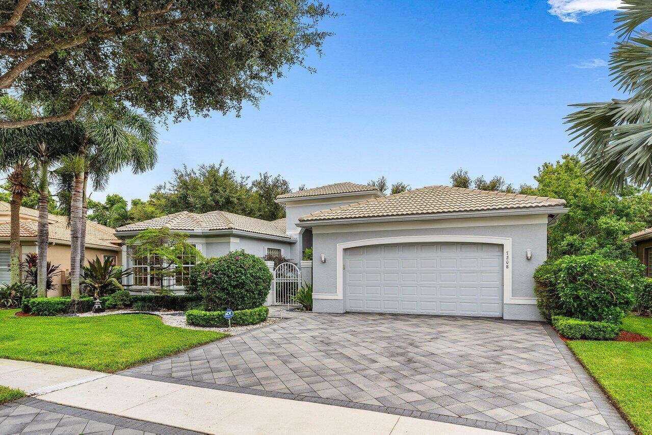 Beautiful Pamplona model features 2 bedrooms + den, 2.5 baths and a large open floorplan with a Great room, situated on an oversized lot with private garden views. Upgrade highlights include neutral tile throughout main living areas, tons of kitchen and bath upgrades, custom closet systems, jetted roman tub upgraded lighting fixtures and recessed lighting, a central vacuum system, newer washer and dryer, epoxy (GF1) garage floor, accordion storm shutters, gutters, upgraded landscaping and so much more! Please call for more details.  HOA Fee includes lawn care, alarm monitoring, phone, cable and internet. Clubhouse recently renovated.