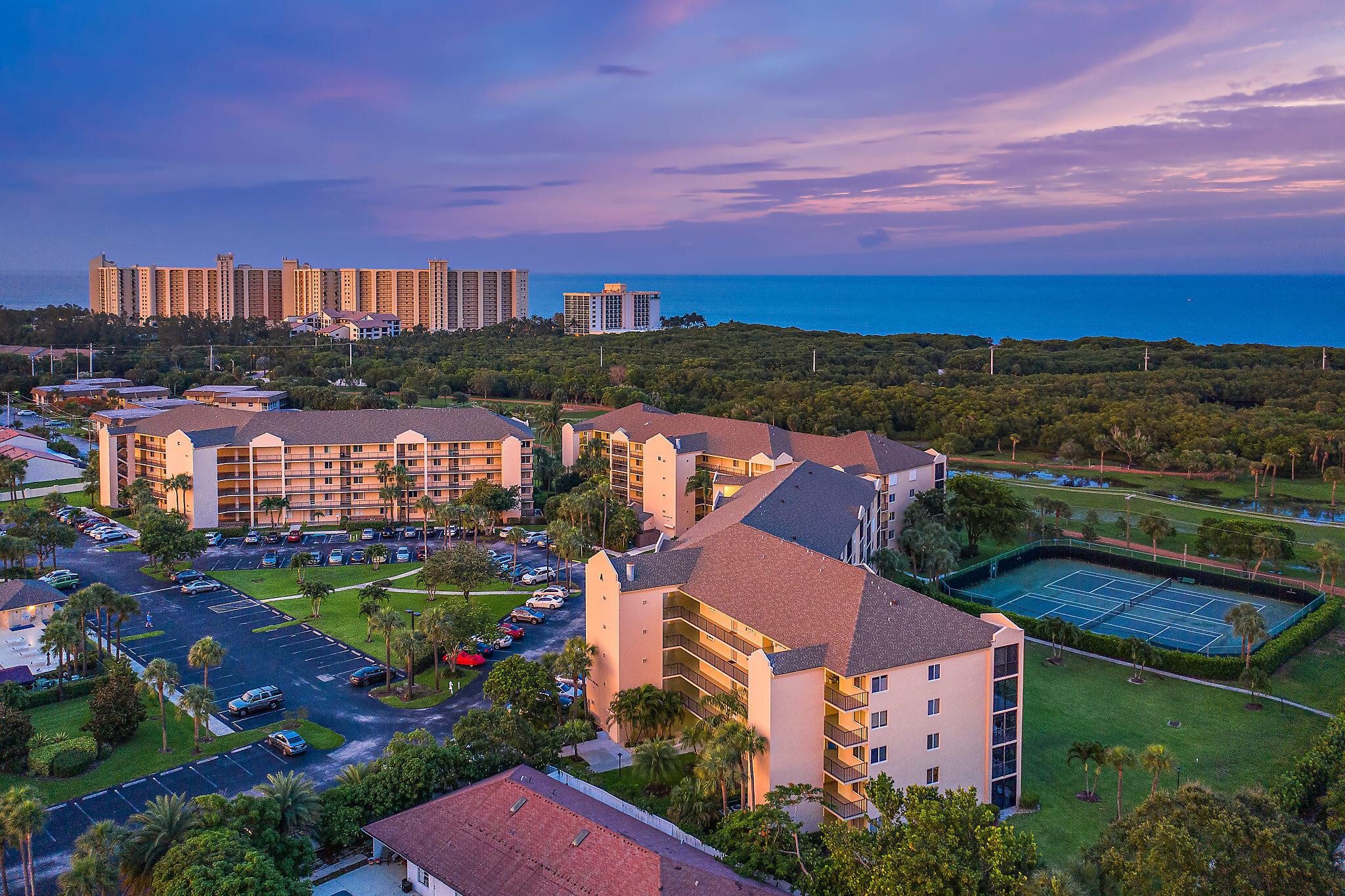 Enjoy unobstructed, panoramic views over the park and the heart trail and direct access to the azure ocean waters. Whether you're here for a week, a month, or taking a longer refuge from the daily grind, this condo offers more than just a place to stay--it promises a lifestyle. Ready to sip sunrises from your balcony and savor calm, mornings? Here, every day feels a bit like a dream. It's not just different; it's a slice of paradise, distinctively yours to enjoy.This condo in sought-after Jupiter Bay offers just that, setting a unique scene that feels like you've landed on a serene, untouched island. Venture just a short walk from your door to sandy beaches, tempting restaurants, and all your shopping needs at the nearby mall. Offered fully turnkey furnished ...just bring your flip flops