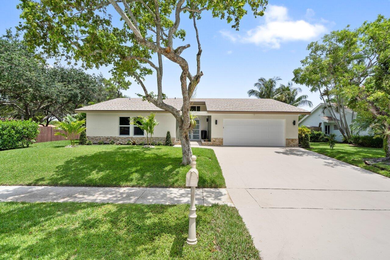 Experience Boca living at its finest in this 3 bedroom 2 bath PLUS den/office area stunning corner-lot home. located in the highly sought-after, family-friendly neighborhood of Timbercreek! Situated on an expansive 9,879 sq ft lot, there's plenty of space to build your dream pool and still enjoy a spacious backyard. This home has been fully renovated from top to bottom, featuring a sleek modern kitchen with a quartz island, elegant porcelain tile flooring throughout, beautifully updated bathrooms, and much more! Zoned for top-rated schools and just minutes from parks, shopping, and dining--this home truly has it all. Don't miss your chance to own a turnkey gem in one of Boca Raton's most desirable communities!