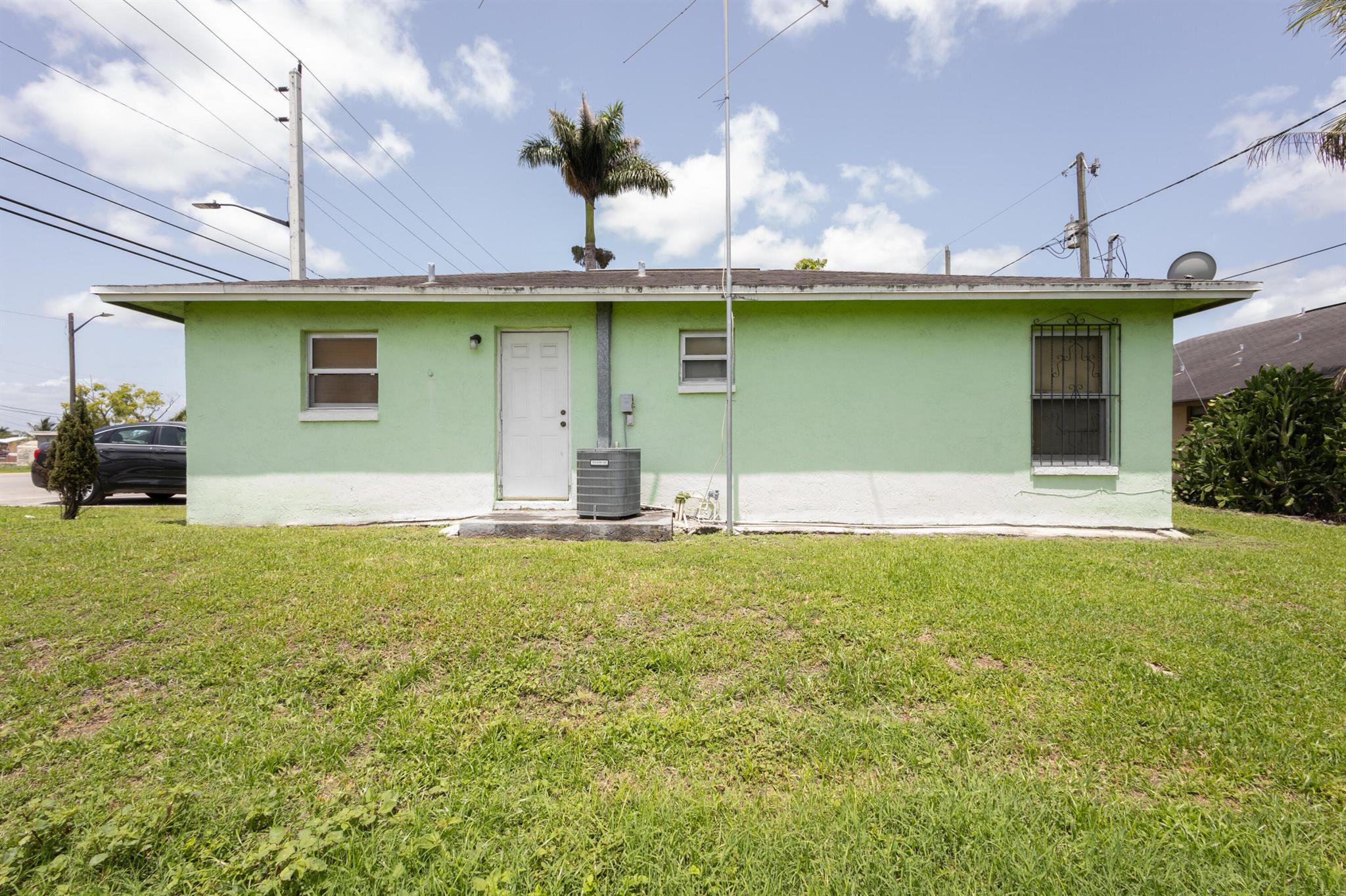 Homes for sale in Belle Glade, FL | 825 Dr Martin Luther King Jr Boulevard W, Belle Glade, FL 33430 | MLS# R11098121