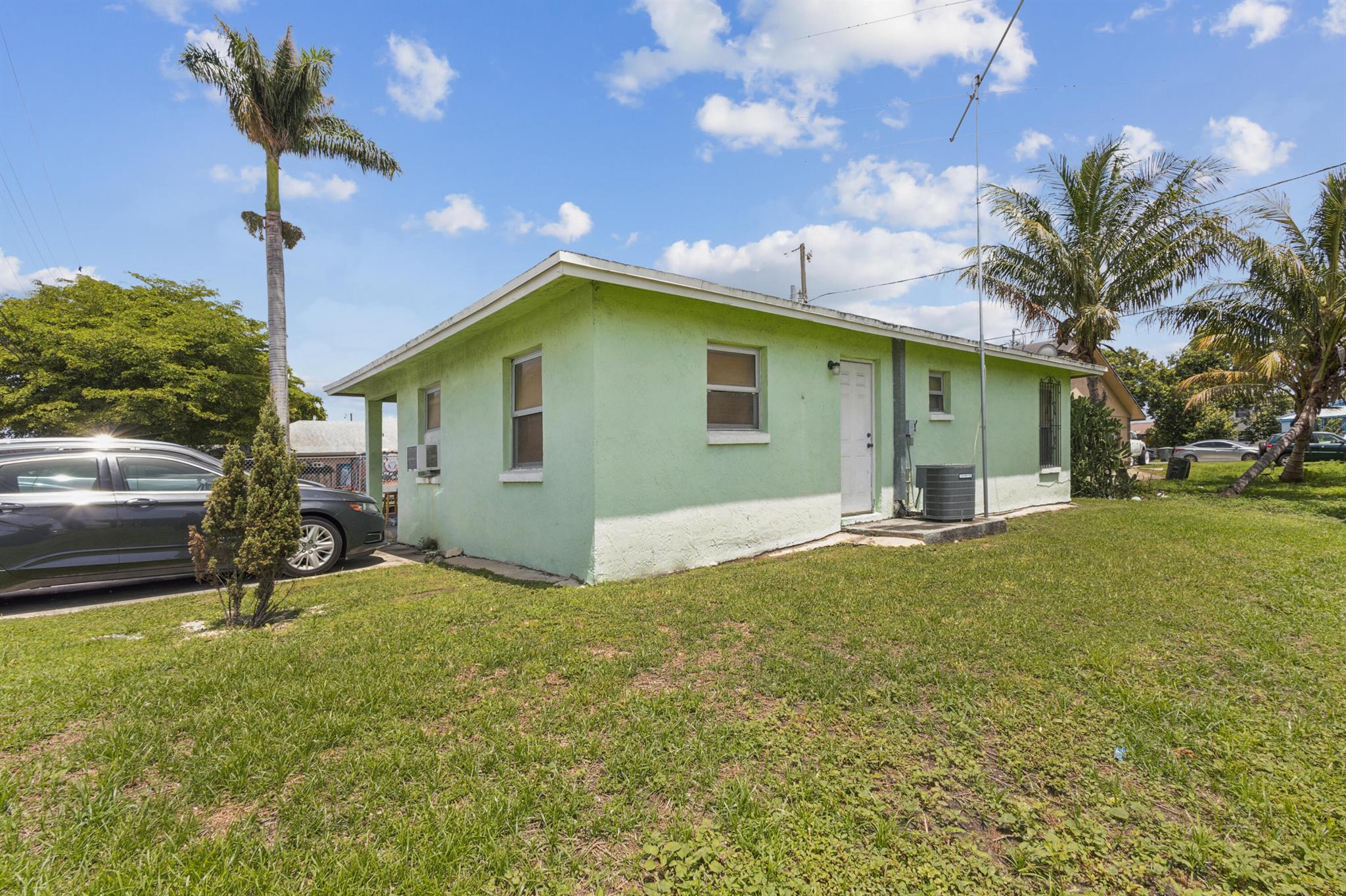 Homes for sale in Belle Glade, FL | 825 Dr Martin Luther King Jr Boulevard W, Belle Glade, FL 33430 | MLS# R11098121