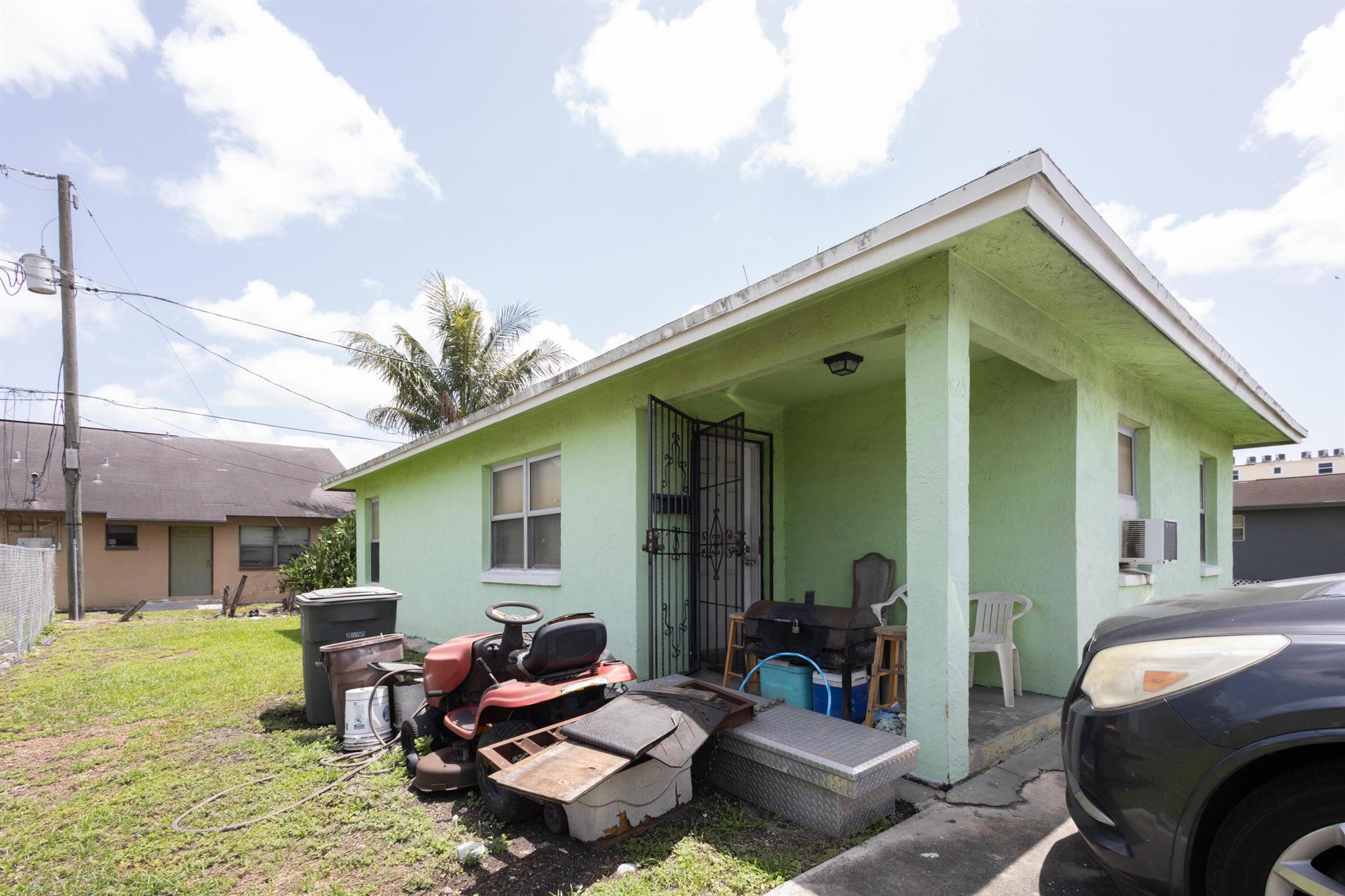 Homes for sale in Belle Glade, FL | 825 Dr Martin Luther King Jr Boulevard W, Belle Glade, FL 33430 | MLS# R11098121