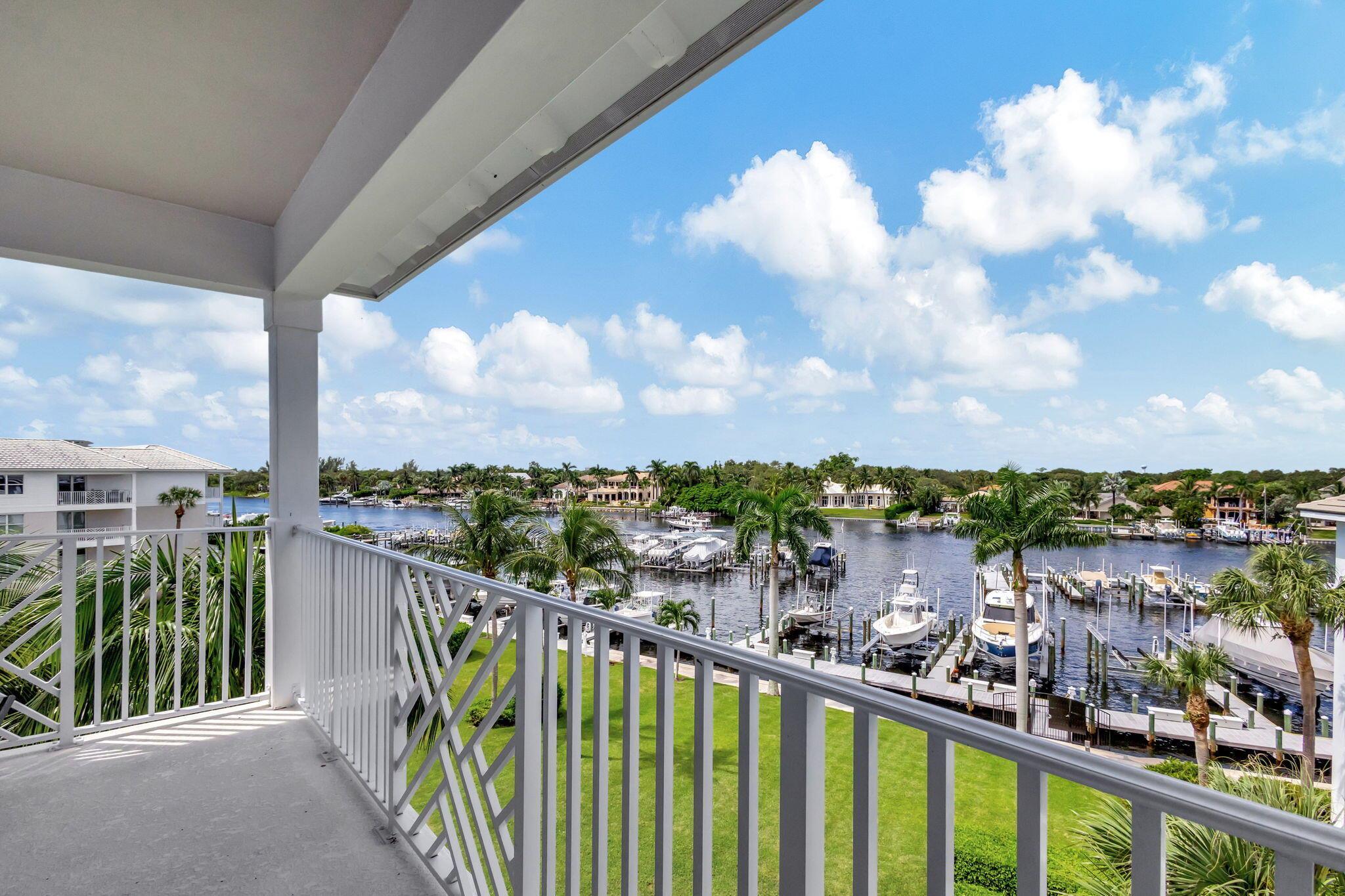 A BOATER'S PARADISE! Penthouse overlooking the Intracoastal Waterway & Bay Colony's Private Marina. Beautiful 3 bed, 2.5 bath condo. Open Floor Plan. Largest model in the community w/ 2 covered balconies. Designer kitchen w/ Bosch appliances, soft close cabinets & drawers w/ pull out shelves. Hardly lived in. Crown Molding. Walk-in Closets. Extra storage on floor. Bay Colony amenities include, gym, pool, spa, tennis, pickle ball, bocce, fire pit & Clubhouse. Boat Slip #20 w/ 24,000# lift may be purchased separately.
