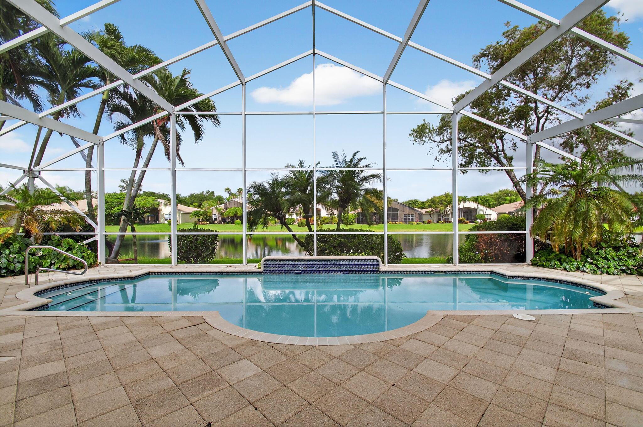 GORGEOUS PALMA MODEL ON THE WATER WITH SCREENED-IN LARGE BEAUTIFUL POOL! ROOF REPLACED 2024.. WHOLE HOUSE PROPANE GENERATOR. LIGHT & AIRY WITH NEUTRAL TILE IN MAIN LIVING AREA. KITCHEN HAS GRANITE COUNTERTOPS, CUSTOM WOOD CABINETS, GLASS TILE BACKSPLASH, STAINLESS STEEL APPLIANCES-DOUBLE WALL OVENS, FRIG, MICROWAVE, UNDER-MOUNT & ABOVE CABINET LIGHTING, FAMILY ROOM HAS VAULTED CEILING, DOOR LEADING OUT TO LANAI, LIVING ROOM HAS FRENCH DOORS LEADING OUT TO LANAI, CATHEDRAL CEILING & TRANSOM WINDOW FOR LOTS OF NATURAL LIGHT. PRIMARY BEDROOM HAS DUAL WALK-IN CLOSETS, PENDENT LIGHTING, DOOR TO LANAI, PRIMARY BATHROOM HAS DUAL SINKS, SEPARATE SHOWER, JETTED TUB, GUEST BEDROOMS HAVE LUXURY VINYL FLOORS, JACK & JILL BATHROOM, LANAI IS COVERED, EXTENDED & HAS ELECTRIC AWNING FOR ADDITIONAL SHADE AND SO MUCH MORE. THIS HOUSE IS TURNKEY AND MOVE-IN READY. VALENCIA FALLS IS AN ACTIVE 55+ COMMUNITY WITH A 25,000 SQ FT CLUBHOUSE THAT HAS A CAFE WITH INDOOR/OUTDOOR DINING, GRAND SOCIAL HALL FOR SHOWS, CARD ROOMS, BILLIARDS ROOM, FITNESS CENTER, AEROBICS STUDIO, RESORT STYLE POOL, TENNIS, PICKLEBALL, BOCCE AND LOTS MORE. THERE ARE OVER 40 CLUBS AND ORGANIZATIONS FOR WHICH YOU CAN BELONG. COME AND ENJOY THE VALENCIA FALLS LIFESTYLE! ALL MEASUREMENTS ARE DEEMED ACCURATE BUT SHOULD BE INDEPENDENTLY VERIFIED.