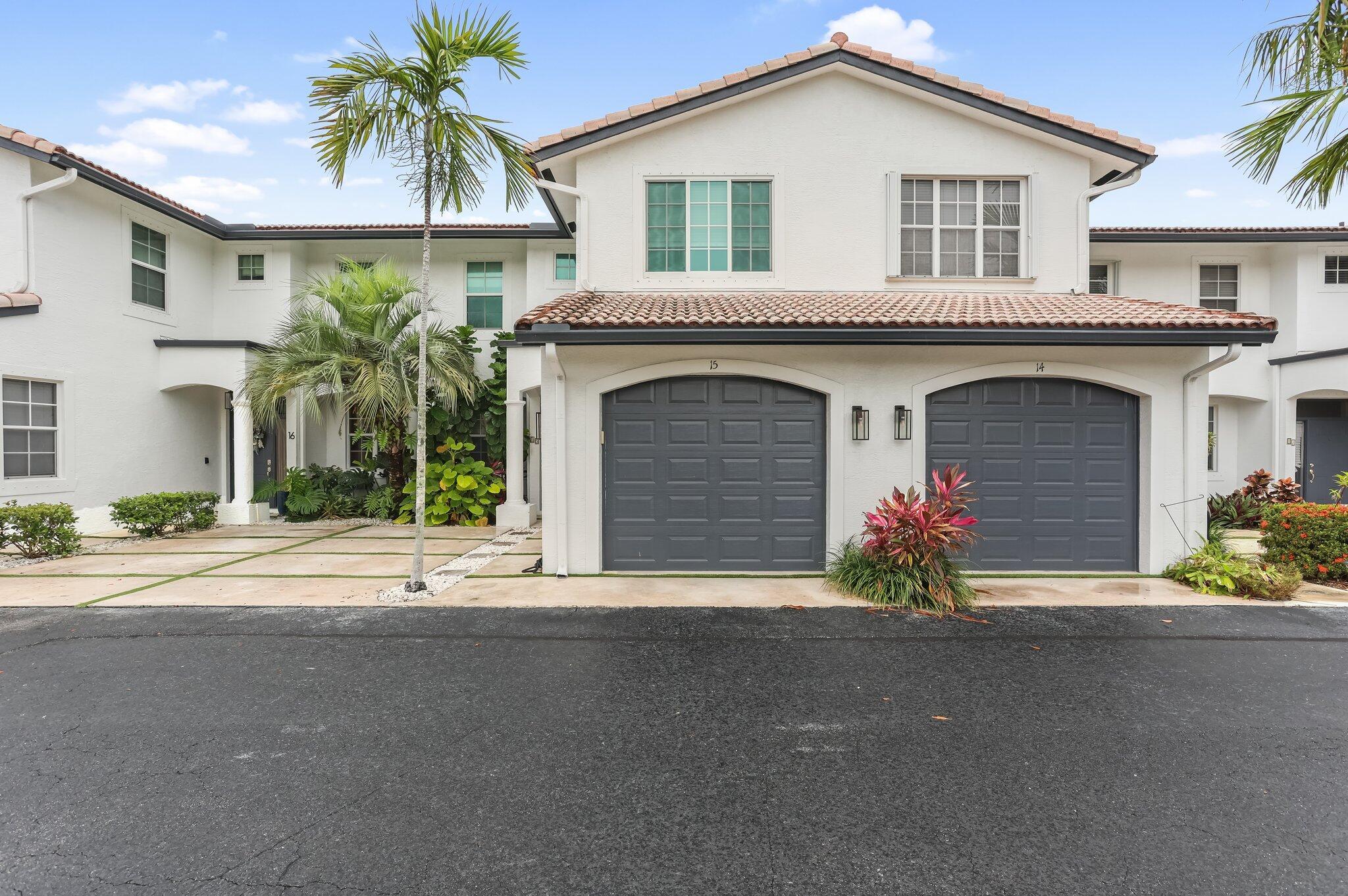 Welcome to this beautifully renovated 3-bed, 2.5-bath townhome with a 1-car garage in desirable East Boca Raton. Offering over 1,600 sq ft of living space, this move-in-ready home features hurricane impact windows, accordion shutters, updated flooring, and an open-concept layout. The modern kitchen includes stainless steel appliances and granite countertops. Upstairs, enjoy updated bathrooms and a convenient laundry area. The private backyard is landscaped with artificial turf--perfect for relaxing or entertaining. Located in a boutique community with a beautiful pool area. Just over a mile to the beach and minutes from downtown Boca and Mizner Park. A rare find in this prime location!
