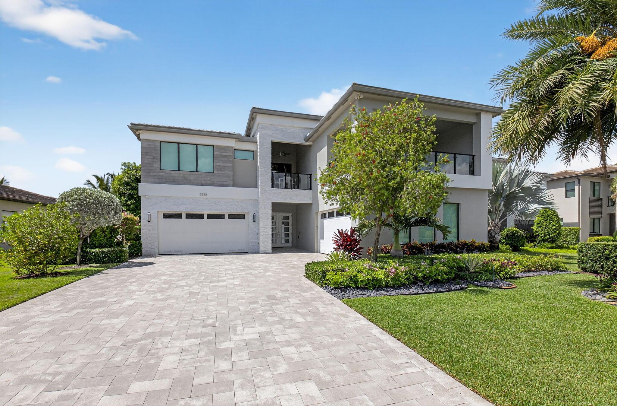 Prestigious Lotus Community! Gorgeous & Unique 5 bedroom 7 bath home with upgraded professional designer finishes, beyond stunning! Lake View & Cul de Sac Location, 5 years new with No Country Club membership.  Amazing home for entertaining or raising a family! The usable easement extra acreage adds amazing space to the pool/patio/play yard overlooking the lake. Total 360 degree smart security system with cameras. 4 Car extended garage with ample guest parking. Porcelain and hardwood floors throughout the home. Wolf and Bosch appliances in the spacious kitchen and the outdoor space thoughtfully designed for entertaining with custom pool/spa, children play area, state of the art summer kitchen with new porcelain countertops and built in seating area for your enjoyment. More...