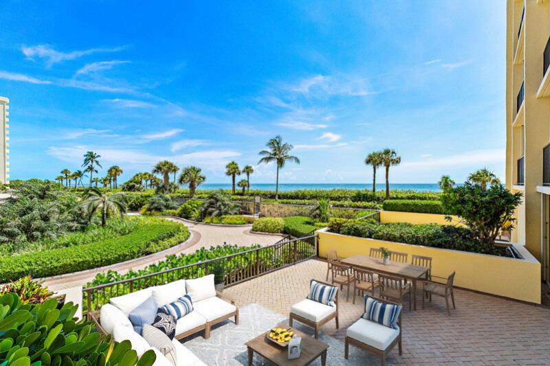 First floor beachfront paradise with expansive private terrace in Ocean Trail. Effortless access directly to the sand, no elevator needed! Perfect opportunity to redesign this 2 bedroom/2 bath unit and make it your own. This condo offers solid bones in a highly desirable location. Bring the outdoors in, listen to the ocean while dining al fresco or simply relax and enjoy the tropical breezes. Not only are there ocean views from the inside but the oversized, private terrace is what truly sets this unit apart! Let the beach become an extension of your backyard! Enjoy resort style amenities including private beach access, private pool, tennis courts, fitness room, club house, underground parking, 24 hour manned gated security-all within walking distance to the best that Jupiter has to offer! Easy stroll or bike ride to Jupiter Inlet, Dubois Park, over 30+ casual and fine dining options, shops, golf, the Maltz theater and the Jupiter Lighthouse!

Building 300 is a well managed building with long term staff and have completed all SIRS/Milestone Inspection reports. ALL assessments have been paid and work completed by this summer!! Quarterly fees are $4507 to the COA + $937.86 to the POA (total is $1814.95 / month). Whether you're looking for a full-time residence, seasonal retreat or investment opportunity, this unit is the perfect blend of convenience, privacy and coastal charm!