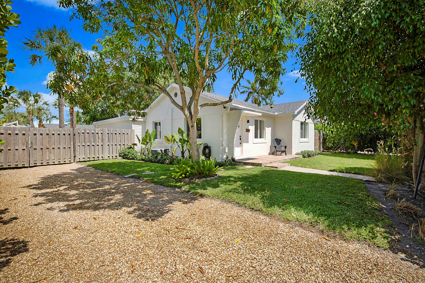 BRAND NEW ROOF (JUNE 2025) -- Prime East Location just 2 blocks from the Intracoastal and a short golf-cart or bike ride to the Ocean, Dinner and Downtown local hotspots from this premier neighborhood surrounded by million dollar estates. In addition to the Brand New Roof this home features FULL IMPACT windows and doors, a fully renovated kitchen with ALL NEW GE Profile stainless steel appliances, new flooring, updated bathrooms, new insulation with added attic storage, a newer A/C (2020), water heater (2022), and washer/dryer (2023). Perfectly set on an oversized and fenced tropical lot, surrounded by lush, towering privacy hedges and offering plenty of space to design your dream pool. SEE REMARKS FOR ADDITIONAL DETAILS Beautifully renovated CBS 2-bedroom, 1-bath main house plus an attached 1-bedroom, 1-bath suite complete with kitchenette, full bath, walk-in closet, and private entrance offering incredible flexibility for an at home office, private guest suite, lock-off rental opportunity, or expanded primary suite.

The brand-new kitchen features crisp white shaker cabinetry, quartz countertops and matching backsplash with picture ledge, Antique Brass hardware by Rejuvenation, and a full suite of all-new GE Profile stainless steel appliances. Enhanced by all new lighting and fully finished ceilings, this home radiates a fresh, calming coastal vibe.

Step outside to a lush newly landscaped backyard designed for ultimate relaxation and entertaining. A beautiful brick patio offers the perfect setting for al fresco dining, illuminated by new dusk-to-dawn caf+¬ lights and patio lighting. Towering mature trees, a flourishing mango tree, and five producing banana trees create a tropical paradise. After a day at the beach, rinse off in the outdoor shower. The extra-long driveway provides ample parking for a boat or RV.

Offering the perfect blend of mid-century charm, modern amenities, and an unbeatable coastal location. Nestled on the East side of town, this home offers unparalleled access to the very best of Coastal Lake Worth Beach:

-5 minutes to downtown boutiques, art galleries, and vibrant local culture

-Dining hotspots including Oceano Kitchen, Paradiso Ristorante, and the iconic Benny's on the Beach

-The soon-to-open Gulf Stream Hotel, an exciting new addition to the area

-Lake Worth Beach and Pier for sun-soaked relaxation

-Lake Worth Beach Golf Club and Palm Beach Par 3 Golf Course for world-class golfing

-A 15-minute bike ride to the ocean

-A short drive to Worth Avenue in Palm Beach for upscale shopping and dining