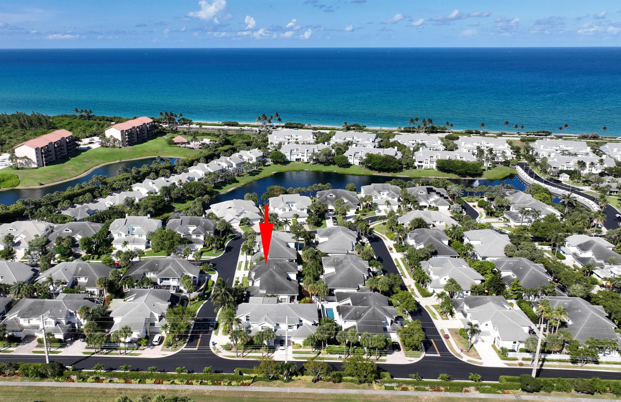 Experience living in the coveted, boutique Sea Colony community with DIRECT BEACH ACCESS! This 2-bedroom, 2 full and 2 half-bathroom home offers over 2,000 sq. ft. of bright, open living space, plus a 2-car garage. Vaulted ceilings, recessed LED lighting, and IMPACT WINDOWS AND DOORS (2024) enhance the airy feel. The remodeled gourmet kitchen is equipped with elegant Corian counter tops (2016), stainless steel appliances and backsplash (2024), custom wood cabinetry and breakfast area. The primary suite includes two walk-in closets, and an en-suite bathroom with split sinks, a private water closet, separate tub, and shower. A fenced-in patio with lush landscaping offers a private retreat. Additional highlights include an upstairs loft with a closet, an exterior half-bath, central vacuum system, and fresh exterior and patio paint (2025). Sea Colony is a gated community with resort-style amenities, including a pool, hot tub, clubhouse, fitness center, tennis and pickleball courts. Close to restaurants, shopping, Harborside, downtown Abacoa, Roger Dean Stadium, Juno Beach Pier, and Carlin Park. All measurements are approximate. Explore the 3D virtual walk-through.