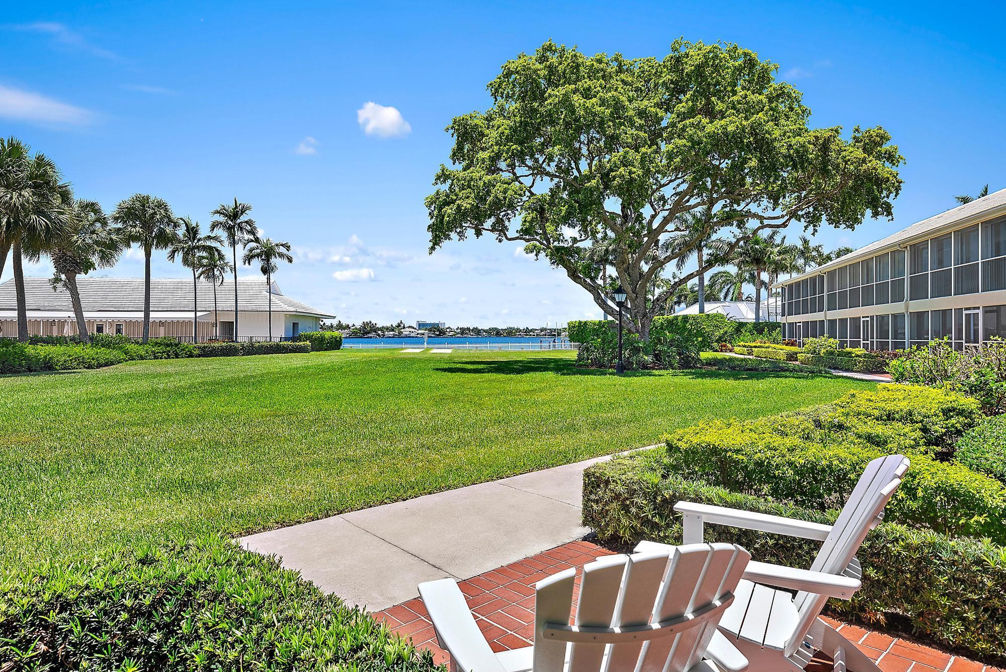 Charming Waterfront Retreat in Lost Tree Village Located in one of the most sought-after waterfront enclaves, this beautifully styled residence offers effortless living with a bright, coastal ambiance and direct views of Little Lake Worth and manicured grounds. The open living and dining areas are framed by floor-to-ceiling glass, inviting in natural light and showcasing tropical landscaping and sparkling water beyond.The updated kitchen features stainless steel appliances, light wood cabinetry with glass inlays, and a breakfast bar that seamlessly flows into the living space--perfect for entertaining or enjoying a quiet morning at home. Tasteful finishes and thoughtful design details bring a modern coastal flair while maintaining a warm, welcoming tone throughout. Step outside your patio and enjoy the peaceful setting, just steps from the water, gym, and clubhouse this makes for an ideal location in the Village. Whether you're savoring the sunset, strolling the lush grounds, or taking advantage of the nearby amenities, this move-in-ready suite offers the ideal blend of comfort, style, and location within the prestigious Lost Tree Village community.