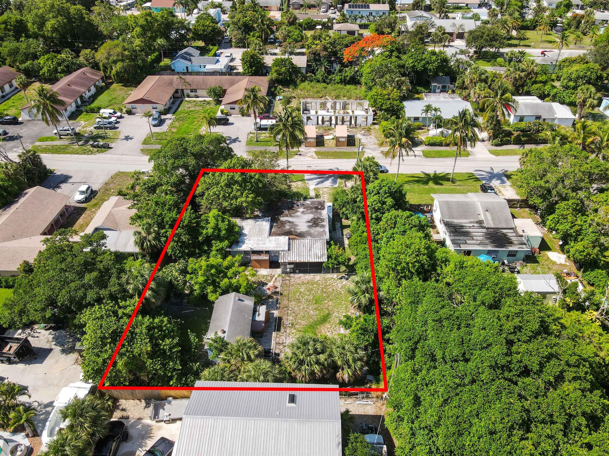 Unlock incredible investment potential with this fantastic 3-family triplex, perfectly situated on an expansive double lot spanning 14,003 sq ft. Located in a highly desirable area close to the pristine shores of Juno Beach and the upscale amenities of Palm Beach Gardens, this property offers not only immediate income generation but also significant future development opportunities. The current zoning allows for up to 6 units total, providing ample room to expand your portfolio. Unit B has been recently remodeled to an impeccable standard, boasting stylish laminate floors, fresh interior paint, a completely renovated bathroom, and a brand-new kitchenette - making it move-in ready and available for immediate showing. Units A and C are currently occupied, ensuring consistent rental income from day one, while the vacant Unit B presents a prime opportunity for owner-occupancy or swift tenant placement at market rates. Beyond its investment appeal, this triplex is nestled in a vibrant community, placing residents just minutes away from fine shopping, exquisite dining, and a wealth of recreational activities. Imagine the allure for tenants with easy access to Juno Beach's beautiful pier, dog-friendly sands, and Loggerhead Marinelife Center, or the upscale retail and dining experiences of Palm Beach Gardens. This property is a rare find, combining a prime location, current income, and exceptional growth potential - a must-see for any savvy investor.