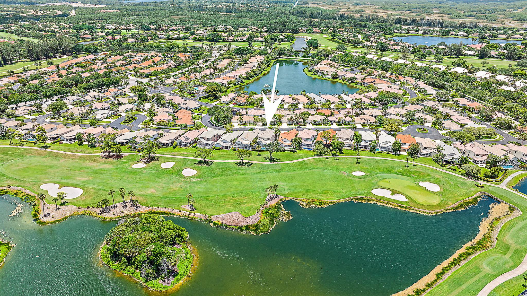 Located in the gated community of Eagleton at PGA National, this beautifully furnished & professionally decorated 3-bedroom, 3.5-bath home offers comfort, style, & an unbeatable setting. With two spacious living areas, a formal dining room, vaulted ceilings, & a DOWNSTAIRS massive primary suite featuring a spa-like bath & oversized shower & two walk-in closets, each with custom built-ins. Step outside to your private pool & spa overlooking the 14th fairway, with views of two additional holes & a tranquil lake beyond. Mornings here feel like a nature retreat -- birdsong, soft breezes, & the occasional golfer passing by. There's a covered outdoor dining area & even a swing where you can relax & take in the scenery or watch the Cognizant Classic right from your backyard.