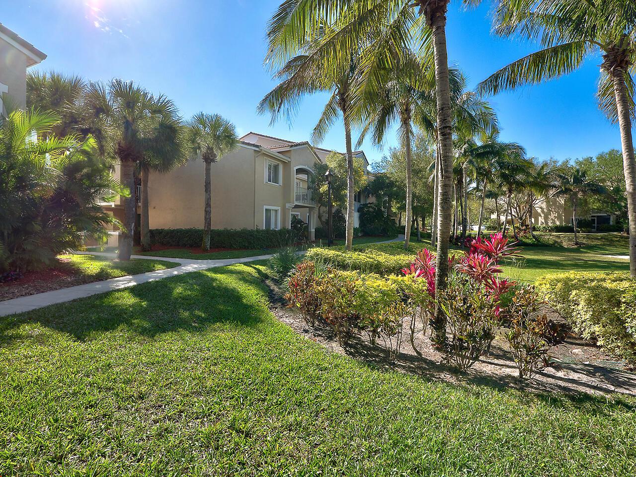 Welcome to your very own tropical oasis in the heart of Lighthouse Cove! This beautifully maintained first-floor condo offers the perfect blend of comfort, style, and convenience. With two spacious bedrooms and two full bathrooms, the thoughtfully designed split floor plan ensures both privacy and functionality--ideal for everyday living or hosting guests.Step inside to find warm wood flooring flowing through the main living areas, creating a welcoming and cohesive space filled with natural charm. The kitchen is tastefully updated with sleek quartz countertops, a newer refrigerator and dishwasher, and plenty of cabinet space--ready for you to whip up your favorite meals or entertain with ease. You'll love the peace of mind that comes with the brand-new AC installed in 2024, making this condo truly move-in ready. Whether you're looking for a full-time residence, a seasonal getaway, or an investment opportunity, this home offers the perfect backdrop to create lasting memories. Come experience the relaxed, coastal lifestyle of Lighthouse Cove&#x14;where tropical beauty, community charm, and everyday comfort come together seamlessly.

Residents enjoy the resort-style amenities offered by the community, including a lavish pool area complete with a charming tiki hut, bar, and BBQ grills, perfect for entertaining guests or simply basking in the Florida sun. Stay active and fit with access to the well-equipped fitness center or unwind with a good book in the library.

Additional amenities such as a business center, billiards room, and various sports courts including tennis, volleyball, and pickleball, cater to every aspect of your lifestyle.

Beyond the confines of Lighthouse Cove, a world of exploration awaits. Discover Jupiter's pristine beaches, including Dubois Park, Coral Cove, and Blowing Rock beaches, just minutes away. Immerse yourself in the area's rich history and culture by visiting the iconic Jupiter Inlet Lighthouse and Museum. With an array of dining, shopping, and entertainment options conveniently located nearby, this condo epitomizes the perfect blend of vibrancy and convenience, enhancing your lifestyle in every way imaginable.