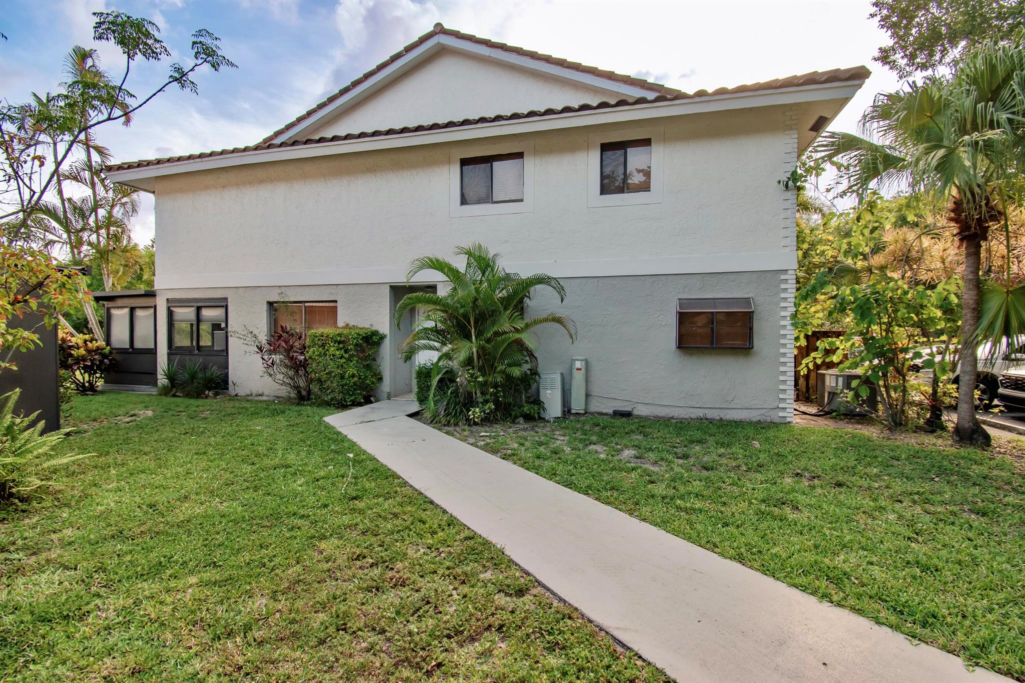Rarely Available 3BR 2.5BA Renovated Corner Lago Townhome With Extended Enclosed Patio & 2 Storage Closets, Overlooking A Large Green Space To Play & A Serene Lake ...Incredible Central Boca Raton Location In A+ School District...Lowest Priced Home Currently Available On Montoya Circle, Updated Kitchen With Wood Cabinetry & Appliances Including Warming Drawer, Two Pantries & Under Stair Storage ,Ceramic Tile On  Entire Main Floor,Upgraded Carpets Recently Replaced On Stairs & Bedrooms Upstairs, Wood Blinds,All Bathrooms Updated, Upstairs Walk In Laundry Room,Upstairs Linen Closet  ...Community Pool,A Pleasure to See! Steps to BRS Won't Last!