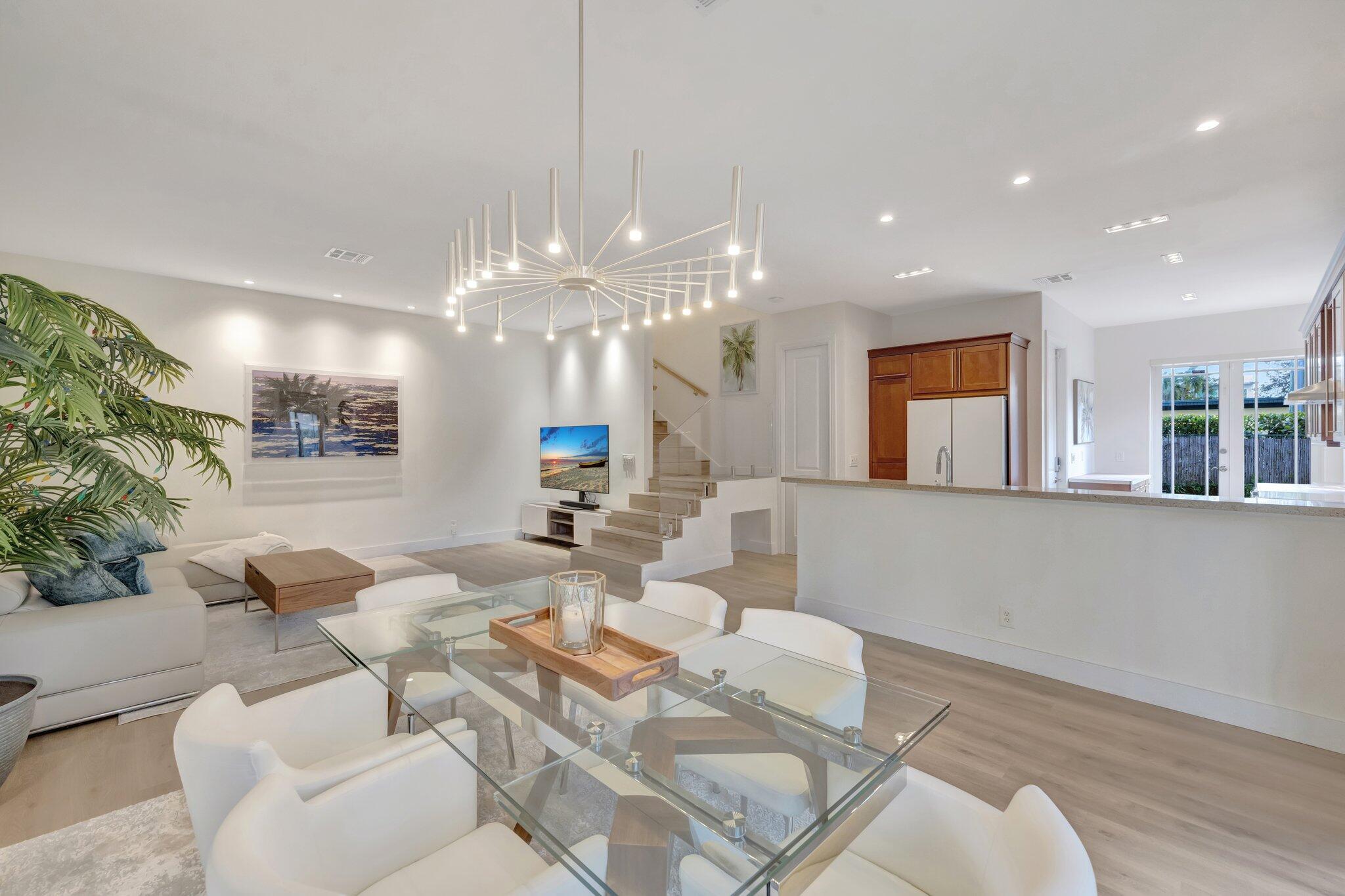 Welcome to your dream home in this PRIME downtown Ft. Lauderdale living Space. This Mediterranean-style townhouse in the heart of Fort Lauderdale's desirable Rio Vista neighborhood. Built in 2005, this updated residence offers 3 bed, 2.5 baths inside it's 1,804 sq ft. of living space. The 1st floor boasts 10-ft ceilings with custom lighting creating a bright and open atmosphere. Upstairs, you'll find three spacious bedrooms. Plus an extra bonus room on the third floor offers flexible space for a home office. Situated on a large corner lot, the property includes a private courtyard with a waterfall pool, perfect for relaxation and outdoor gatherings. A 2 car garage with ample parking and storage space. Minutes From las Olas Beach! | AC 2018 | MUST SEE! Present All Offers
