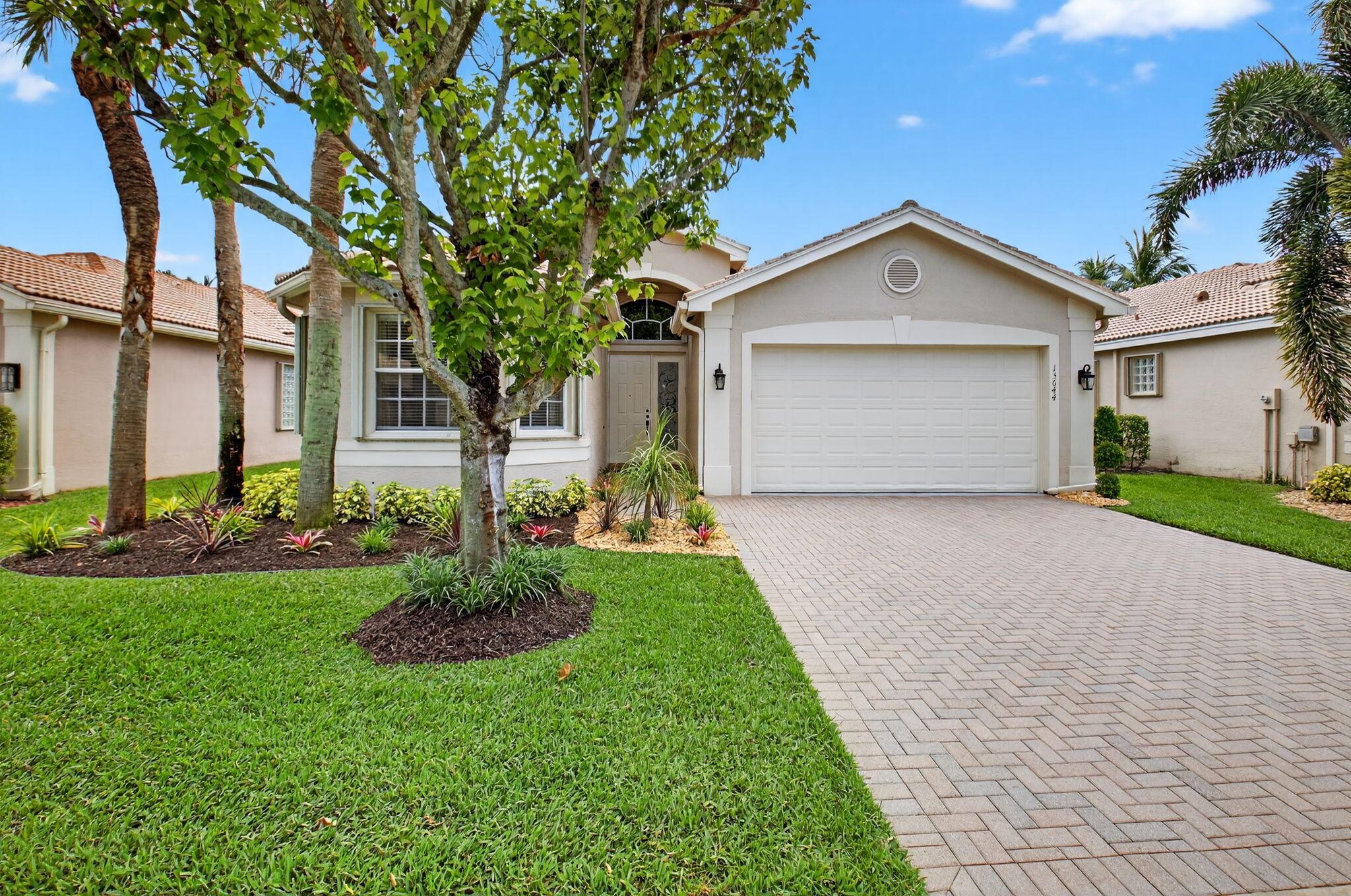 Valencia Palms Beauty. This Indian Model has Upgrades Galore. Gorgeous 30x30 Neutral Tile Throughout. Kitchen is a Show Stopper and Features Off White Wood Cabinets, High End Granite with Waterfall Edges, Custom Island and Stainless Appliances. Neutral Paint. Custom Faux Painting. Decorator Window Treatments and Drapes. Crown Molding Throughout. Custom Closets in Front Bedroom and Primary Bedroom. 3rd Bedroom is Set Up As an Office with a Custom Built in Wrap Around Desk with Granite Top. Professional Landscaping in Front and Back Yard. Lovely Patio is Great for Entertaining and Features a View of Lake. Accordion Shutters. Furniture Negotiable. Hurry!
