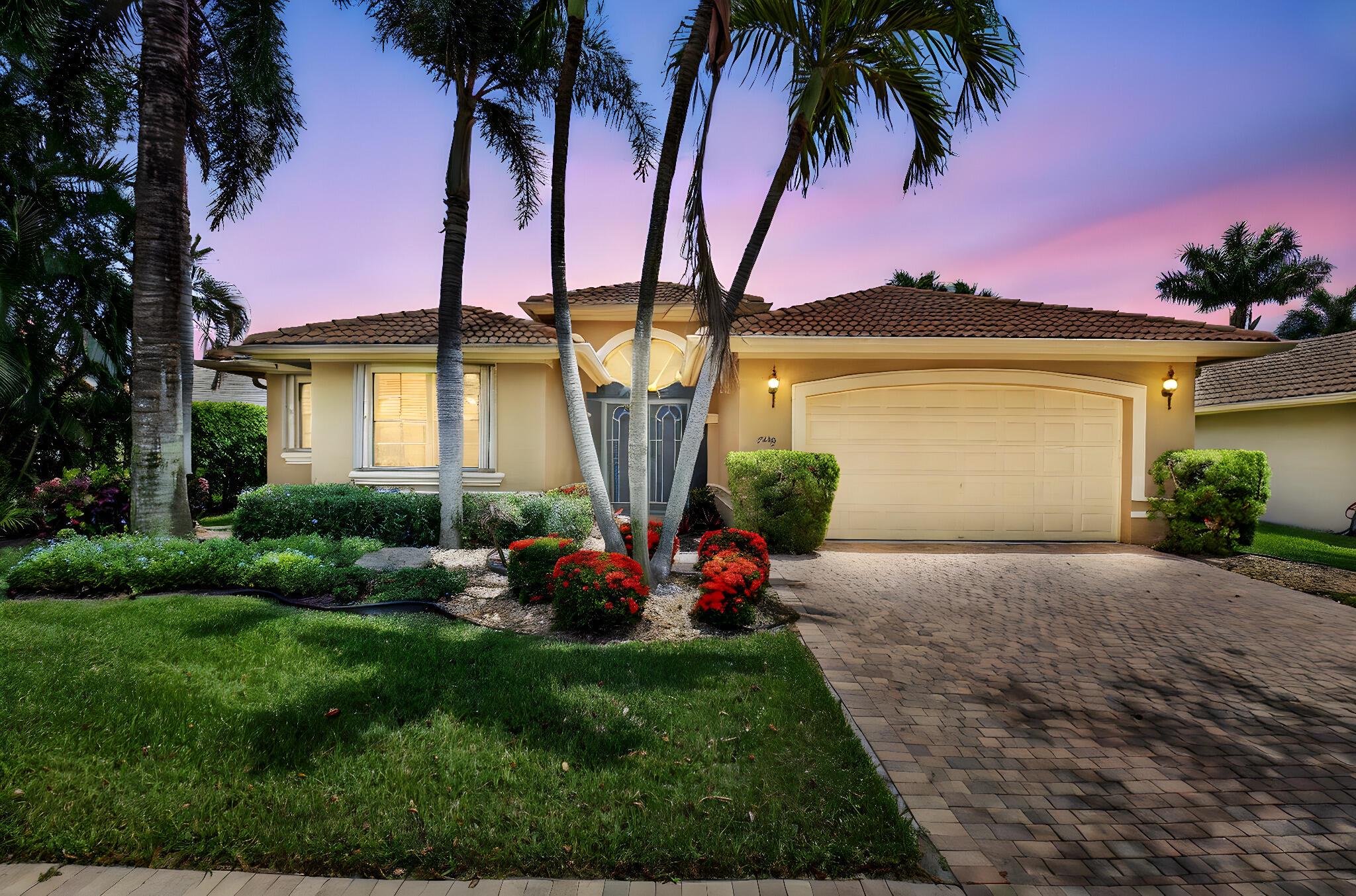 MOTIVATED SELLER!!!Welcome to the highly sought-after Palazzo Roma model, one of the most spacious and thoughtfully designed floorplans in Tivoli Reserve, a prestigious 55+ gated estate community in Boynton Beach. Ideally located with tranquil lake views, this expansive 4 bedroom, 3 bathroom residence with a 2 car garage offers a rare triple-split layout--perfect for multigenerational living, hosting guests, or creating dedicated work and hobby spaces. From the moment you enter through the elegant double-door entry with clerestory glass, you're greeted by soaring volume ceilings, a bright and open foyer, and abundant natural light streaming through oversized windows and sliding glass doors. The home features distinct formal living and dining areas, a cozy family room overlooking the water, and a gourmet eat-in kitchen complete with granite countertops, white cabinetry, stainless steel appliances, a walk-in pantry with custom pull-out drawers, under-cabinet lighting, and a breakfast bar that seats four comfortably.

The oversized primary suite is a luxurious retreat with lake views, plush carpeting, 2 large walk-in closets with custom shelving, a dressing area, and an expansive en-suite bathroom featuring dual vanities, a soaking tub, a glass-enclosed walk-in shower, and a private water closet. The 2 front guest bedrooms share a stylish Jack and Jill bathroom, while the 4th bedroom, located in its own private wing near a 3rd full bath, includes a built-in desk and cabinetry&#x14;ideal for guests, an office, or a creative space. A separate laundry room includes a washer, dryer, utility sink, and additional storage cabinetry with direct garage access. The spacious 2 car garage offers bonus storage, and the home includes several valuable upgrades for peace of mind and long-term comfort.

Inside, the home's refined finishes include crown molding, recessed lighting, custom built-in cabinetry, coffered ceilings in select areas, and architectural details such as art niches and plant shelves. A Rheem AC unit was installed in 2020, with a 2nd unit added in 2022&#x14;both covered under transferable maintenance contracts through the year 2027. The hot water heater was replaced in August 2023, the garage door motor was updated in June 2021, and the roof was professionally inspected and maintained 2 years ago. For added protection, shutters are installed on all windows and doors, ensuring full storm readiness.

This estate home showcases Mediterranean-inspired architectural details, including a stucco exterior with decorative banding, concrete Spanish double roll tile roof, anodized bronze windows, and brick pavers on the driveway, walkway, and covered veranda. The landscaped yard is fully sodded with an automatic sprinkler system, decorative mailbox and post, coach lights flanking the garage, and a screened-in, covered patio that provides the perfect place to relax or entertain while taking in serene lake views. With ample backyard space, there's also the opportunity to add a custom pool and further enhance your personal outdoor oasis.

Tivoli Reserve is a meticulously maintained community of just 220 estate homes, offering a peaceful and upscale lifestyle for active adults 55+. At the heart of the community is a beautifully renovated clubhouse overlooking a lake with three lighted fountains. Residents enjoy a vibrant social calendar, resort-style heated pool with lakeside veranda, 2 new pickleball courts, lighted tennis courts, a state-of-the-art fitness center, and a game room with billiards.

Perfectly located in central Boynton Beach, Tivoli Reserve provides quick access to top-rated restaurants, golf courses like Indian Spring and Westchester, major shopping destinations including Boynton Beach Mall and Delray Marketplace, and world-class healthcare at nearby Bethesda Hospitals. Downtown Delray Beach and Boca Raton are just a short drive away, offering fine dining, art galleries, live entertainment, and oceanfront attractions. Nature lovers will enjoy nearby preserves like Wakodahatchee Wetlands and Green Cay Nature Center, while beachgoers are just minutes from the Atlantic coastline. With easy access to both I-95 and Florida's Turnpike, Tivoli Reserve offers the ideal blend of luxury, lifestyle, and location&#x14;making it one of South Florida's most desirable active adult communities.