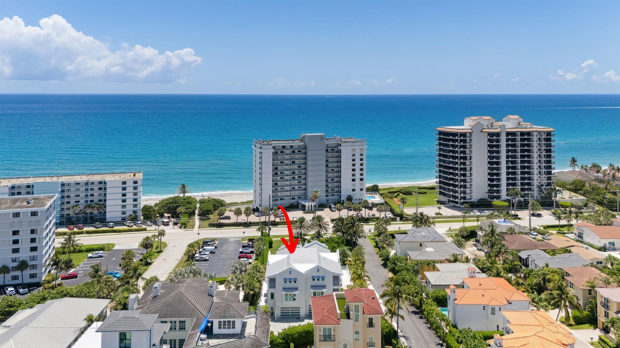 Welcome to 461 Venus Drive The Crown Jewel of Juno Beach. Discover the ultimate in luxury coastal living, arguably the finest beach home in all of Juno Beach. Just completed in late December 2024, this stunning three-story townhome offers over 4,200 square feet of thoughtfully designed living space, top of the line finishes, and unmatched ocean views from nearly every east- and north-facing window. Juno Beach is a hidden gem a pristine coastal town known for its natural sand dunes, nature preserves, and Old Florida charm. Located within walking distance to top-rated restaurants, boutique shops, and cozy coffee spots, the neighborhood is not only beautiful but also consistently ranked as one of the safest places to live in Florida. And best of all, there's no HOA. The first floor offers a flexible layout that can function as a cabana, guest suite, or home office. It features custom built-ins with refrigerated drawers and connects through pocket doors to a bedroom and full bath that also serves as a cabana bath. Just outside, your private oasis awaits with a saltwater pool, white marble pavers, a covered loggia with a fully equipped summer kitchen, and cool ocean breezes. A full-house generator provides peace of mind and uninterrupted comfort year-round. On the second floor, the open-concept living space is bright and elegant with massive 48"x48" marble flooring throughout. The living, dining, and kitchen areas are all part of one seamless space centered around a stunning 13-foot island with quartz countertops. The kitchen is fully outfitted with a WOLF gas range, Miele appliances, and a built in espresso machine, and a walk-in pantry. Just off the main living area, you'll find an oversized terrace perfect for lounging or entertaining. Down the hall, there's a designated wine room, a spacious laundry room, and a beautifully finished guest suite with two large walk-in closets. As you reach the third floor, floor-to-ceiling windows at the top of the stairs flood the space with natural light and showcase spectacular views of the Atlantic Ocean. The oversized primary suite features a cozy sitting area, a private terrace with panoramic ocean views where you can watch the sunrise from your bed, and a gas fireplace for those cold front chilly Florida nights. The spa-like primary bathroom includes a long hallway, his and hers closets, custom vanity, dual toilets, dual vanities, a dedicated makeup station, and a massive walk-in shower with two showerheads and a gorgeous quartzite accent wall overlooking the freestanding soaking tub. Across the hallway is another spacious en suite bedroom, complete with a wet bar, offering comfort and privacy for guests. Car lovers will appreciate the oversized tandem garage that can accommodate up to three cars&#x14;or four smaller ones, like Porsche 911s. And best of all, you're directly across the street from beach access. This is truly a once-in-a-lifetime opportunity to own one of Juno Beach's most luxurious new homes, just steps from the sand. No HOA, brand-new construction, and surrounded by nature and walkable charm&#x14;don't miss your chance to live the ultimate beach lifestyle at 461 Venus Drive.