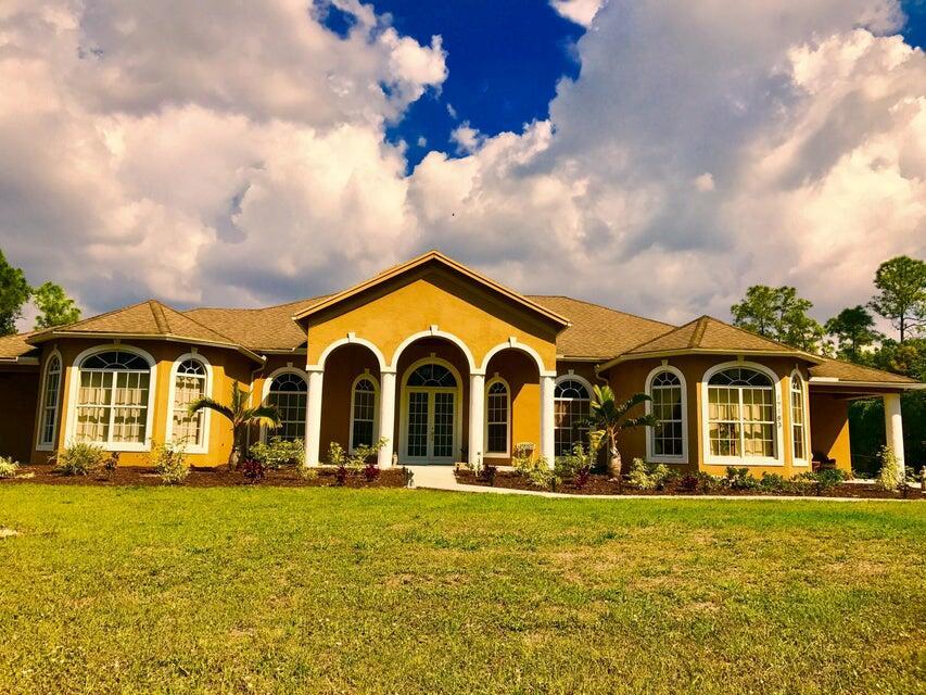 MASSIVE AND AMAZING CUSTOM HOME ON 1.15 ACRES!! NO HOA! LUXURY LIVING IN THE COUNTRY. 5 BEDROOM 4 BATH MAIN HOUSE WITH SEPARATE GUEST/ INLAW QUARTERS. ELEGANT ENTRY. HUGE OPEN CONCEPT KITCHEN, 42 IN CABINETS,GRANITE AND STAINLESS APPLIANCES- WITH VIEW TO FAMILY ROOM. WOOD BURNING FIREPLACE, LIV RM AND DIN RM. LOTS OF NATURAL LIGHT. DOUBLE DOORS LEADS TO LARGE MASTER SUITE WITH SITTING/ OFFICE/ EXERCISE AREA- OVERLOOKING GEORGOUS POOL AREA AND ANOTHER FIREPLACE. MASTER BATH W/ JACCUZZI TUB, HIS AND HER SINK AND SEPARATE SHOWER AND TOILET. HUGE WALK IN CLOSET 13X8! LEFT WING ALSO INCLUDES BED#2 W HUGE BAY WINDOWS AND A PRIVATE PORCH. RIGHT WING W/ 3 BEDROOMS 1 FULL BATH. 1 ROOM HAS AN ENTRANCE AND ANOTHER PRIVATE PORCH. COME SEE FOR YOURSELF!