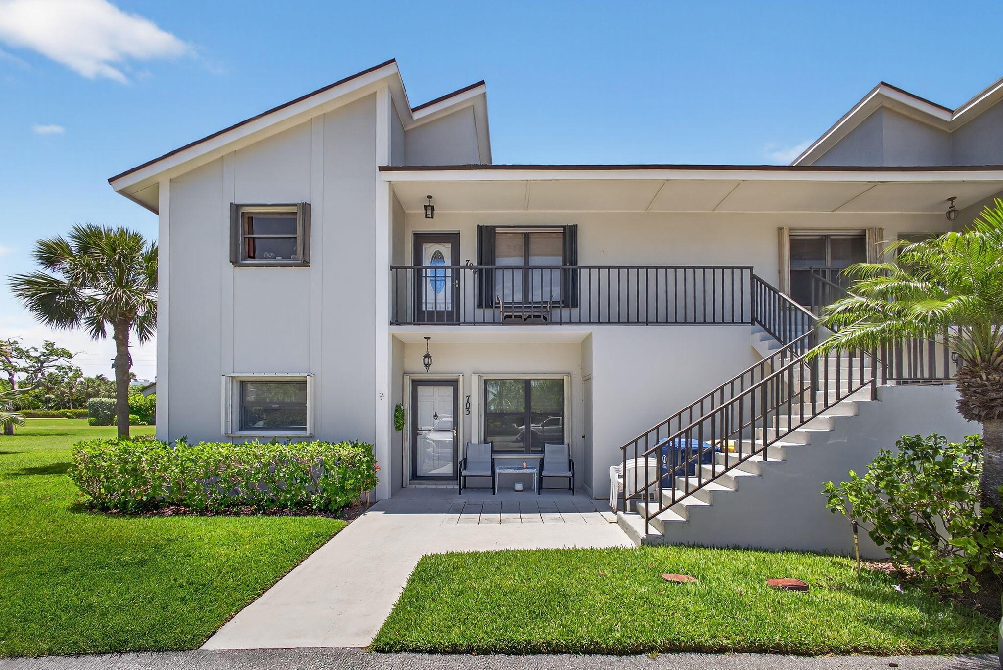 Beautiful and spacious condo in sought-after Jupiter Dunes.Welcome to this well-maintained condo located on the scenic Jupiter Dunes Par 3 golf course, just a short walk to the beach. This residence offers comfort and coastal charm, with wood floors throughout, a working fireplace, and serene golf course views.The spacious kitchen provides plenty of room for cooking and entertaining, while two full baths ensure convenience for residents and guests. The enclosed patio offers valuable flex space, perfect for a home office, reading nook, or hobby area. Additional highlights include a roof from 2022, AC from 2023, and a hot water heater installed in 2024. Additional features include attic space and a downstairs storage room for added functionality. Enjoy your morning coffee by the ocean, and take advantage of the nearby restaurants, shopping, and entertainment.

This is Jupiter living at its finest&#x14;ideal as a year-round home or seasonal getaway.

Schedule your private showing today.