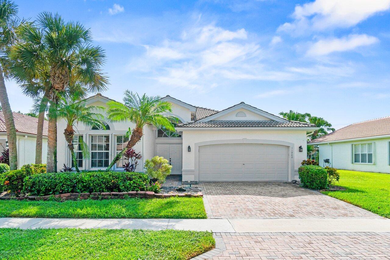 Stunning Fully Redone Home in Valencia Lakes. This Masterpiece is Like no Other in the Community. This Mediterranean Floor Plan has Been Redesigned with Walls Removed to Open the Entire House. There are Modern Floors Everywhere. The Stunning Kitchen Boasts Two Tone Wood Cabinets, Quartz Counters and High End Stainless Steel Appliances. The Large Primary Bedroom Includes a Luxurious New Bathroom with Huge Walk In Shower and Freestanding Tub as Well as all New Cabinets and Flooring. No Expense was Spared in Creating this Remarkable Home. Step Out to Your Screened and Covered Patio For Your Private Garden and Lake Views. Valencia Lakes is an Incredible Active Adult Community with a Brand New Gorgeous Clubhouse that Includes a Cafe, Theater, Card Rooms & More. Do Not Miss this Opportunity!