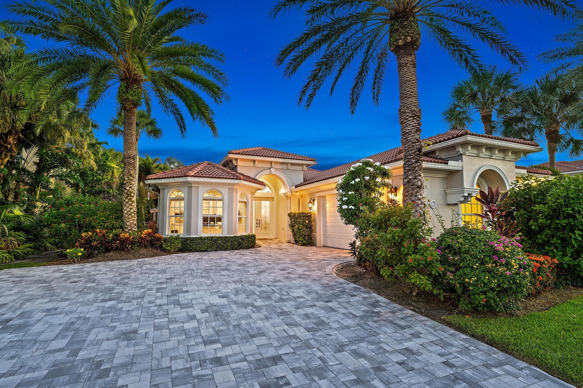 LUXURIOUS, fully renovated single-story CBS pool home nestled in the prestigious gated golf course community of Jupiter Country Club. This extended Salerno model offers 3 spacious bedrooms, 2.5 bathrooms, a versatile den, and just over 2,500 square feet of exquisitely upgraded living space. Located directly on the golf course and overlooking a tranquil lake, this former model home features soaring volume ceilings, brand-new porcelain tile flooring throughout, a designer kitchen, impact windows, and an expansive screened-in patio with a heated saltwater pool, spa, and summer kitchen -- the epitome of South Florida luxury living.Upon entering through double impact glass front doors, you are welcomed by bright, open interiors and sweeping views of the resort-style backyard. The spacious family room flows seamlessly into the formal dining space and a beautifully appointed home office with custom built-in cabinetry and glass shelving. A stylish half-bath is tucked conveniently nearby. The open-concept layout continues into the heart of the home &#x14; a show-stopping chef's kitchen featuring white wood cabinetry, high-end GE Monogram stainless steel appliances including a gas cooktop, built-in wine cooler, decorative backsplash, and an oversized kitchen island with 3-inch Quartzite countertops and seating for four. A cozy breakfast nook sits just off the kitchen with panoramic views of the pool and lush landscaping.

The primary suite is a serene retreat with direct views of the pool and gardens, and features a custom double-sided walk-in closet system. The spa-inspired ensuite bath is designed to impress with dual vanities, Quartzite countertops, and a luxurious oversized shower complete with dual Moen rainheads, body jets, a frameless glass enclosure, and a smart steam room system operable from your phone.

A thoughtfully designed split floor plan places the two guest bedrooms on the opposite side of the home, each with built-in closets and plush carpet (with extra tile available if desired). The guest bathroom has been fully remodeled and offers a double vanity with Quartzite counters, frameless glass shower, and floor-to-ceiling designer tile.

Step outside to your own private oasis. The oversized screened-in patio is ideal for entertaining with a heated saltwater pool and spa, cascading waterfall feature, built-in grill, and ample deck space for lounging or dining. The .33-acre lot is professionally landscaped with custom lighting, fully fenced, and includes additional green space beyond the patio &#x14; perfect for children, pets, or simply relaxing while taking in the lake and golf course views.

Additional home features include coffered ceilings with custom wood millwork, built-in speakers with Sonos system throughout, epoxy-finished two-car garage with built-in cabinetry, an extended driveway with new pavers, and CBS construction with full hurricane impact windows for peace of mind.

Jupiter Country Club offers an exceptional lifestyle with amenities including a Greg Norman Signature Golf Course, tennis and pickleball courts, brand-new fitness center, basketball, bocce, resort-style swimming, a restaurant and clubhouse, pro shop, children's play area, and social events. A $10,000 social membership provides access to the full range of community offerings, with optional upgrades to XLife for regional and national benefits.

Ideally located in the heart of Jupiter with access to top-rated schools, just minutes from world-class beaches, fine dining, shopping, and with quick access to both I-95 and the Florida Turnpike. Palm Beach International Airport is just a short drive away.

This stunning, turn-key home will not last &#x14; schedule your private tour today and make your move to luxury living in Jupiter Country Club!