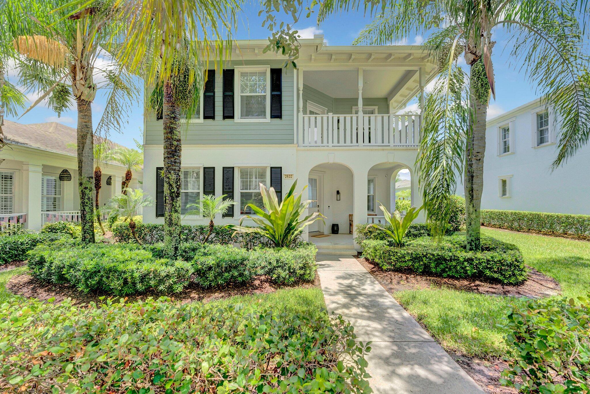 Beautifully updated 3 bedroom, 2.5 bath pool home plus den in tree lined, peaceful location of vibrant family community.   A first floor open floor plan flows from kitchen and great room to backyard oasis featuring covered patio, private pool and turf grass.    Upstairs the home boasts 3 bedrooms 2 full baths and charming balcony. Additional features include luxury vinyl plank flooring throughout the home, new appliances, crown molding, brand new roof completed first week July 2025 and aluminum panel shutters.  Green spaces, community pool and civic center, local parks and walkable to Roger Dean stadium, shopping and restaurants round out this must see!
