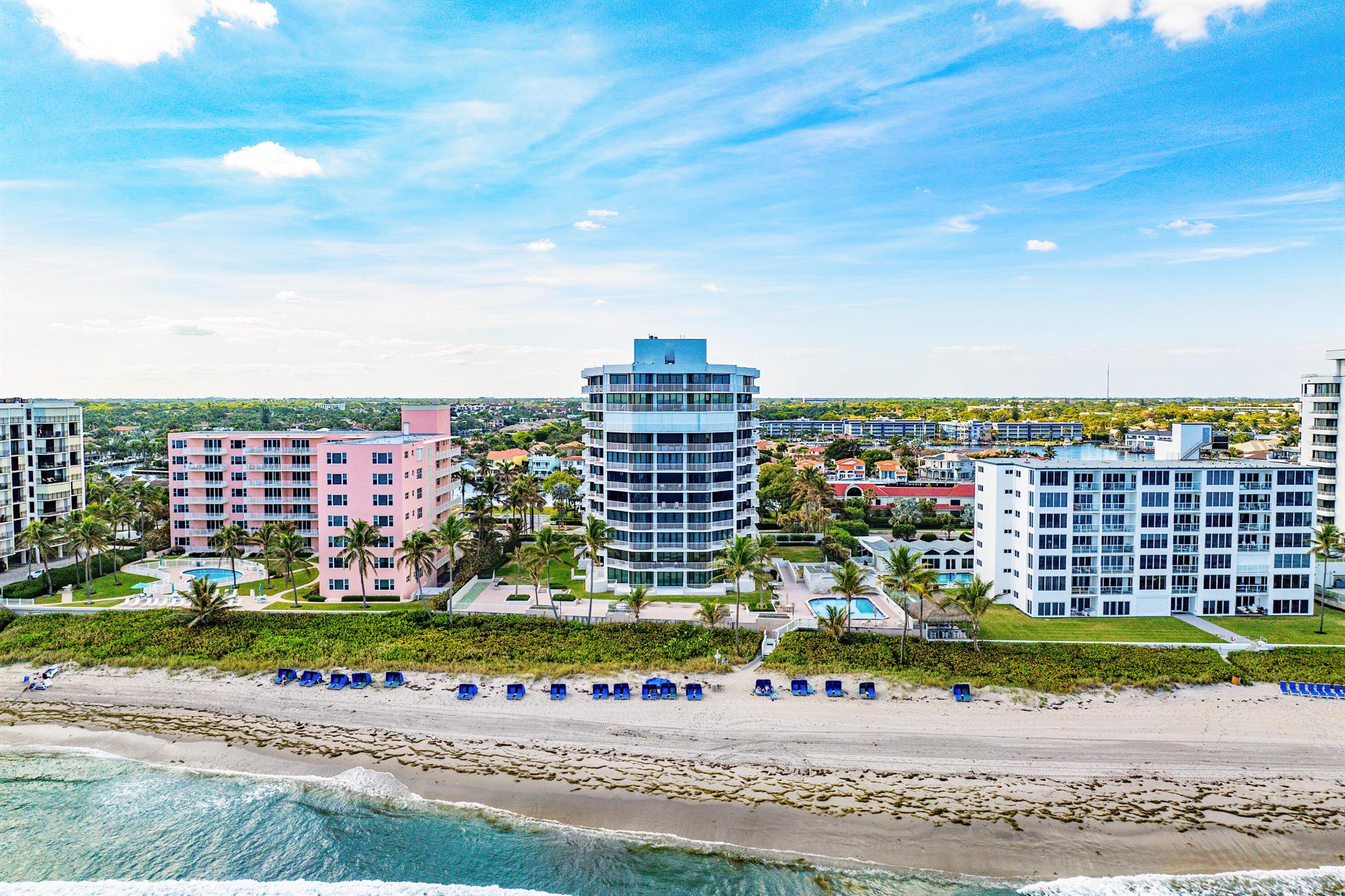 Luxurious elevated living in this 3-bedroom, 3.1 bathroom condominium at Trafalgar, Highland Beach. Condo embodies the ultimate in oceanfront living. Nestled on the 5th floor of this prestigious boutique condominium, the residence offers stunning panoramic views of the Atlantic Ocean and the Intracoastal from every room. Two balconies (completely renovated in 2024) span the entire length of the condo further enrich the indoor/outdoor living experience. The condo has been beautifully updated with newly installed impact windows, RG6 and Cat 6 wiring, all interior doors with glass insert and rail lighting. Spacious great room offers a service bar, wood floors and sliding doors opening to balconies with spectacular ocean views. Den/3rd bedroom further expands this entertaining space. Bright k