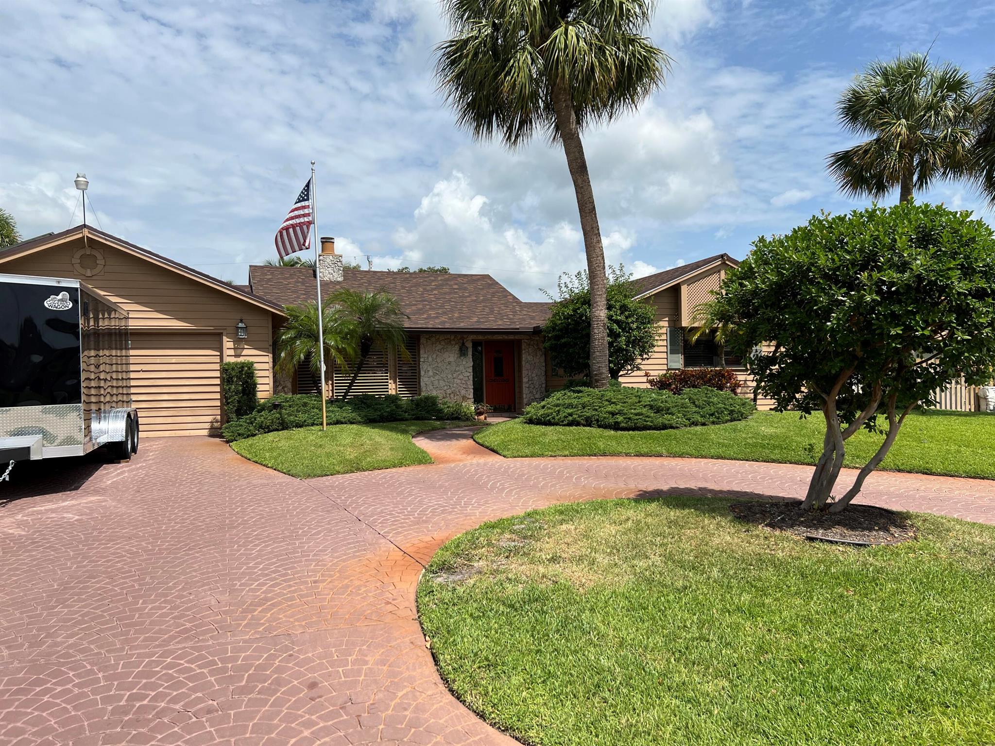 WELCOME TO TURTLE CREEK ONE OF THE MOST SOUGHT AFTER GATED COMMUNTIES IN TEQUESTA. THE OWNERS BUILT THIS HOUSE IN 1984.THIS RANCH STYLE HOME HAS 2 MASTER SUITES 2 BATHS AND A HALF BATH THAT CONNECTS TO THE LAUNDRY RM THAT LEADS OUTSIDE TO THE POOL AREA.ENTER THE FRONT CORAL ENTRANCE WITH HIGH CEILINGS AND A FAMILY RM WITH A CORAL FIREPLACE AND FORMAL DINING AREA.EXTRAS INCLUDE- RECESSED LIGHTING, SKYLIGHTS,NEW SHINGLE ROOF IN 2025, AND NEW AC IN 2025, GENERAC GENERATOR 2200 KW, 2 CAR GARAGE WITH LOTS OF STORAGE,OVERSIZED WALKIN SHED WITH POWER,NO HOA'S!, SCREENED IN POOL WITH HOT TUB,THAT RUNS OFF OF SOLAR PANELS, ALSO WATERHEATER RUNS ON SOLAR PANEL. ENJOY THE TURTLE CREEK COUNRTY CLUB JUST ONE BLOCK AWAY- A GOLFERS DREAM.. THIS 18 HOLE GOLF COURSE WAS DESIGNED BY THE FAMOUS JOE LEE AND WAS COMPLETELY RENOVATED IN 2016.THE CLUB ALSO HAS PRO GOLF SHOP, AND A TIKI BAR. ENJOY ALL THAT JUPITER HAS TO OFFER AND GIVE THIS PROPERTY YOUR SPECIAL TOUCH AND MAKE IT YOUR OWN!! BRING US YOUR OFFERS!!