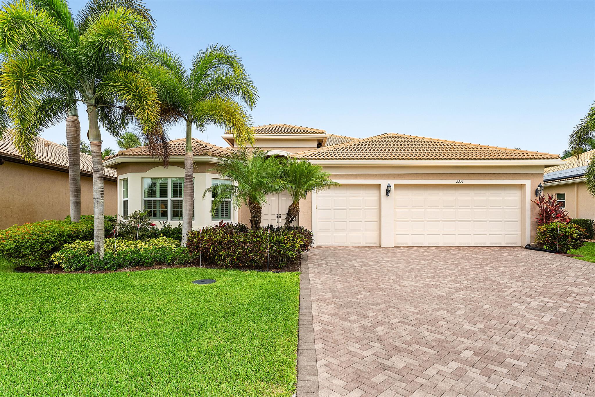 This lushly landscaped Julia model (3/3.1+den+3cg) sits on an oversized  private lot. Features include impact windows, full house generator, upgraded  a/c, 24x24 rectified polished tile floors, crown & wall moldings, built-ins, designer window treatments & light fixtures, recessed lights, fans, custom closets, upgraded baths & more! The gourmet kitchen has antique white wood cabinets, quartz countertops, glass tile backsplash, island with contrasting wood cabinets and all the bells & whistles! Large master suite with luxurious bath. All guest bedrooms are ensuite. You'll love the backyard area with large grassy area, covered extended patio with hurricane screen & large ''birdcage'' screen. Valencia Cove is a premier 55+ lifestyle community featuring a spectacular 39,000 square-foot clubhouse and 10 acre outdoor recreational facility. Endless activities and opportunities for fun abound - there are activities, trips, shows, and clubs of all types. The clubhouse features an expansive foyer and lobby, grand ballroom with raised stage and dance floor, four spacious card rooms, Cafe with indoor/outdoor seating, Arts and crafts room with kiln, Internet/Billiards room, Office, Catering kitchen with separate demonstration cooking studio, Yoga &amp; exercise studio with ping pong, fully equipped fitness center and men's and women's locker rooms with steam rooms, massage room and showers. There are four pools - a beautiful Resort-style pool and Shade Pavilions, Lap pool with Swimmers' Lap Lanes, Resistance walking pool, Grandchildren's wading pool, and an Outdoor whirlpool spa. There are eight har-tru tennis courts with shade pavilions and lighting for night play, tennis pro shop, tennis pro, league play, six pickleball courts, pickleball pro, league play, 2 bocce courts, league play, half-court basketball and walking/jogging/biking paths throughout and just outside the community. Valencia Cove is conveniently located near shopping, restaurants, houses of worship and major highways!