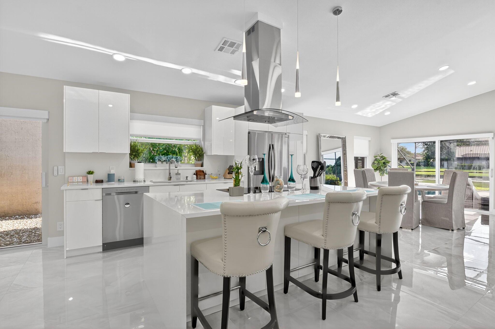 This stunning 3-bedroom, 2-bath waterfront home has it all--bright, open, and beautifully updated from top to bottom. Just bring your toothbrush--there's absolutely nothing to do but move in! Completely remodeled just a few years ago, this home features a modern, stylish design with updated bathrooms, a finished garage with epoxy flooring, electric fireplace, and all the big-ticket items: newer appliances, AC, sprinkler system, water heater, and a 2022 roof. The current owner added impact windows and chic window treatments for a polished finish.The kitchen is a true showstopper with custom cabinetry, quartz countertops, waterfall island, and stainless steel appliances. Enjoy the Florida lifestyle in your fully screened-in yard with a beautifully resurfaced and re-tiled poolperfect for relaxing or entertaining.

Brentwood is a well-maintained community with a clubhouse, fitness center, two heated pools, hot tub, and tennis courts&#x14;all in an unbeatable location close to everything.