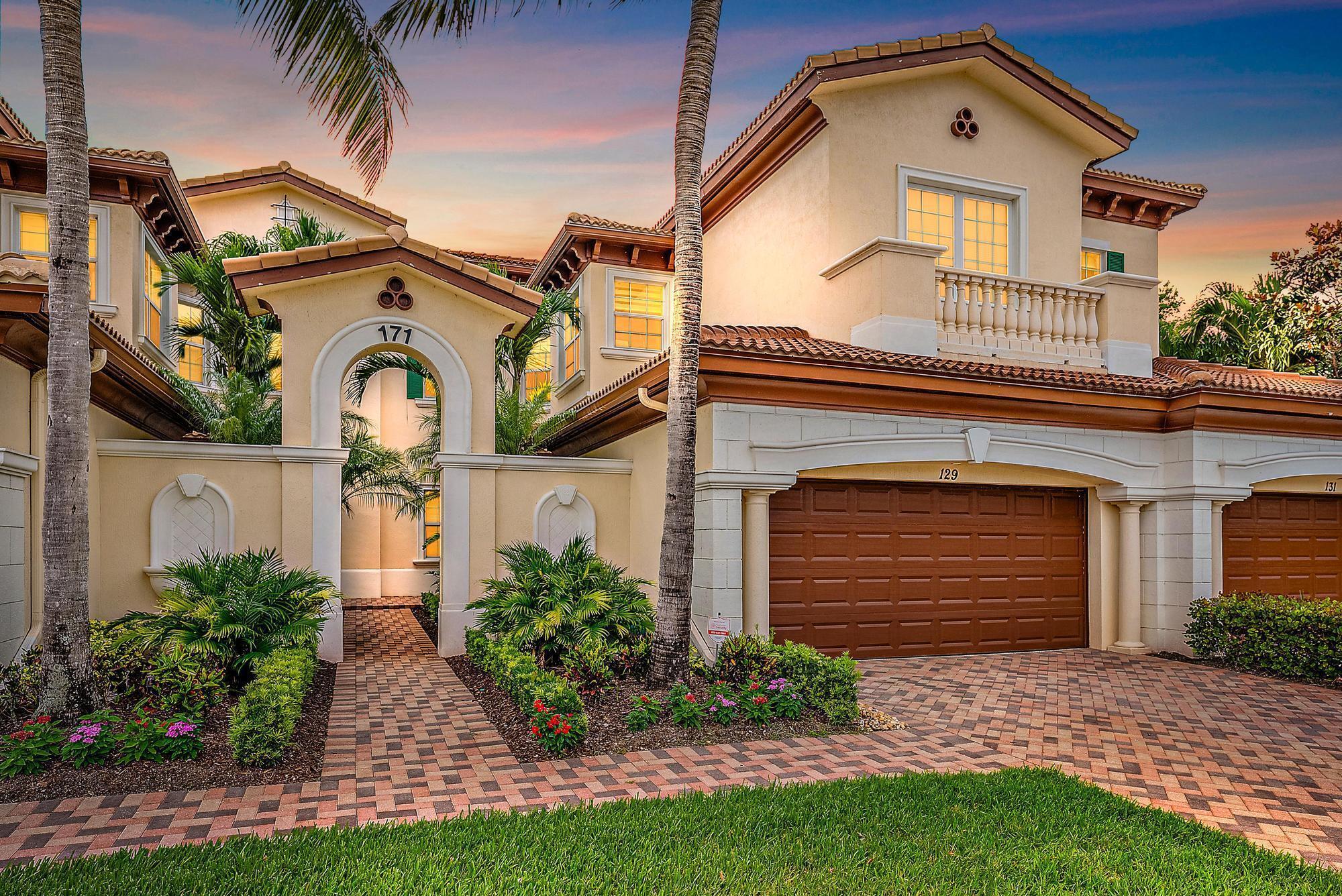 Welcome to this beautifully designed contemporary condo, nestled in the prestigious Jupiter Country Club. Built in 2016, this meticulously maintained 2-bedroom, 2-bath plus den residence offers modern luxury and unparalleled comfort. With an open floorplan that's flooded with natural light, this home is perfect for both relaxing and entertaining.The spacious living area features a built-in Sonos sound system and electric shades, creating a seamless blend of style and functionality. The open-concept kitchen is a chef's dream, equipped with sleek quartz countertops and a built-in desk workstation, ideal for today's modern lifestyle.Overlooking the 8th hole of the golf course, the expansive primary suite offers a true retreat, complete with crown molding and a luxurious spa